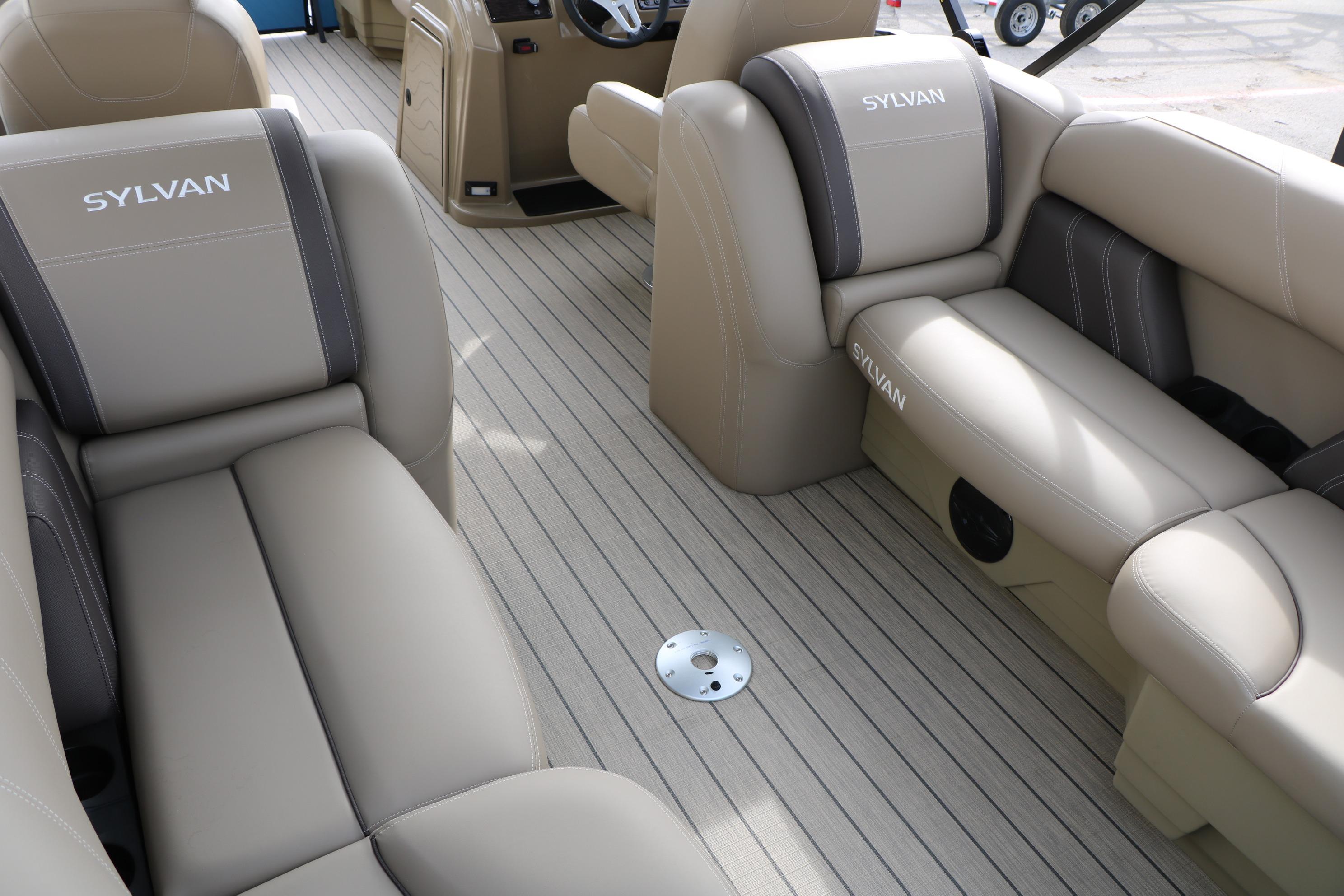 2026 Sylvan Mirage 822 LZ interior with beige seating and sleek design.