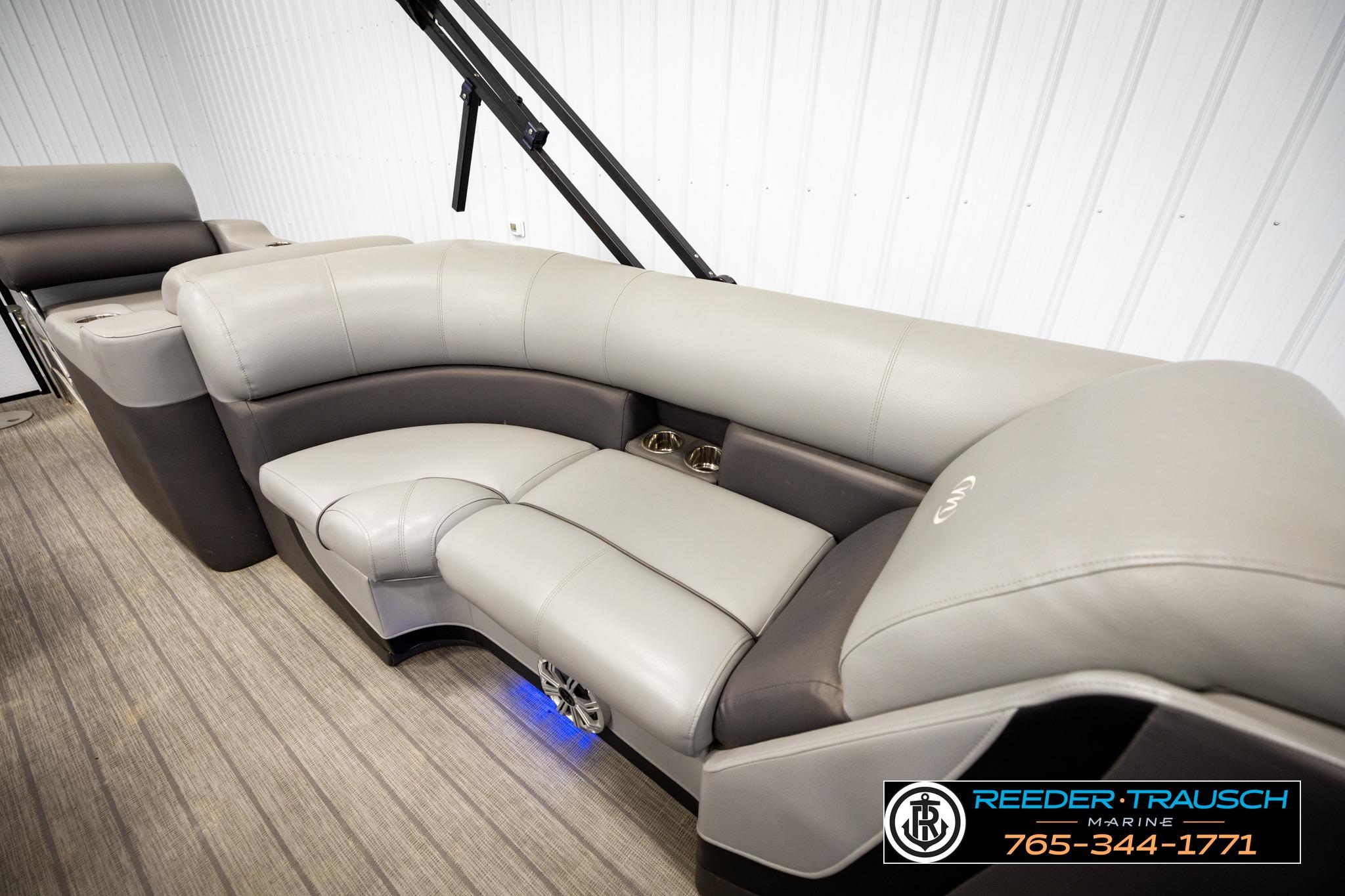 2019 Manitou Oasis SR VP pontoon boat interior with plush seating and modern design.