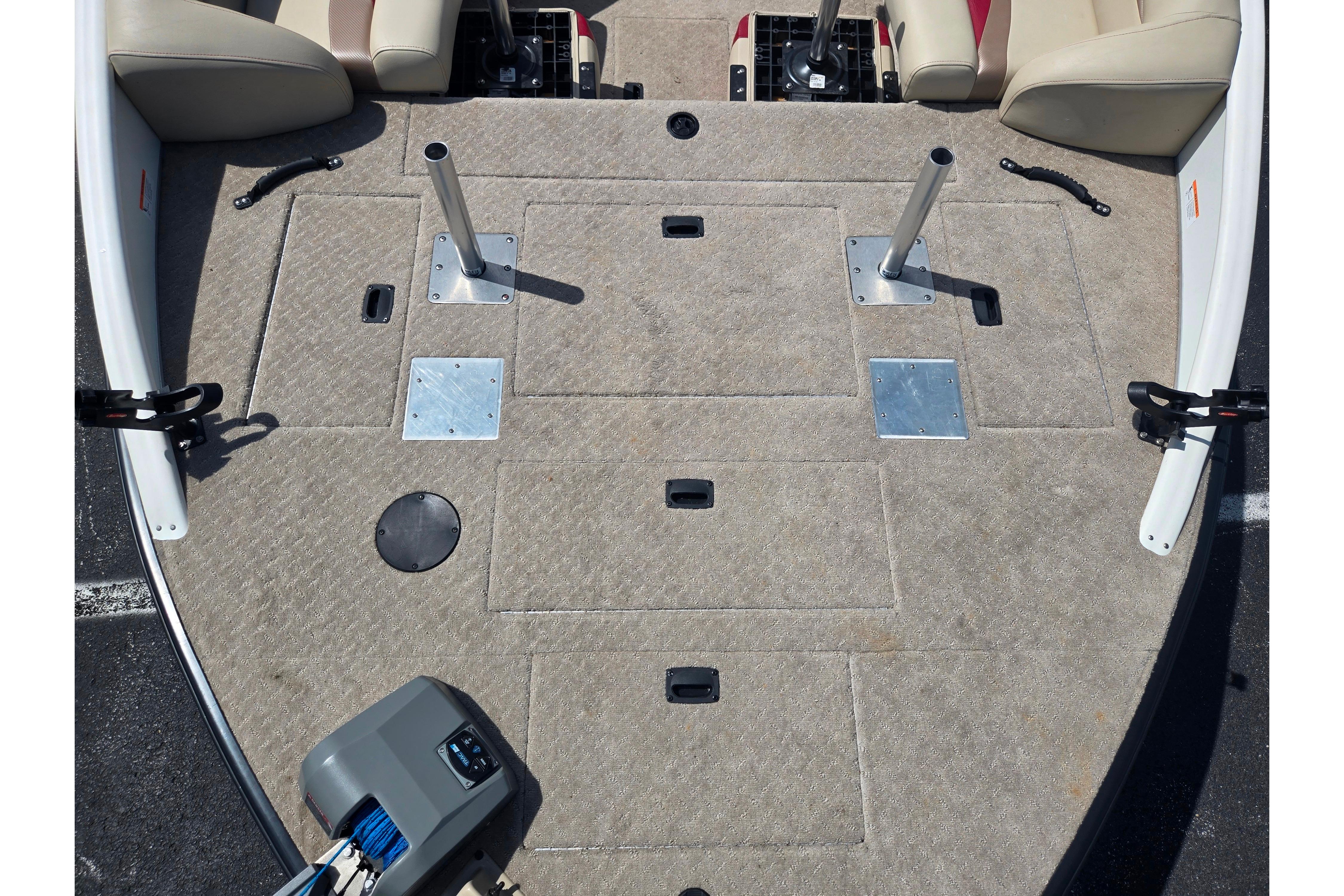 2015 Lowe Sport Deck 224 boat interior with beige seating and fishing rod holders.