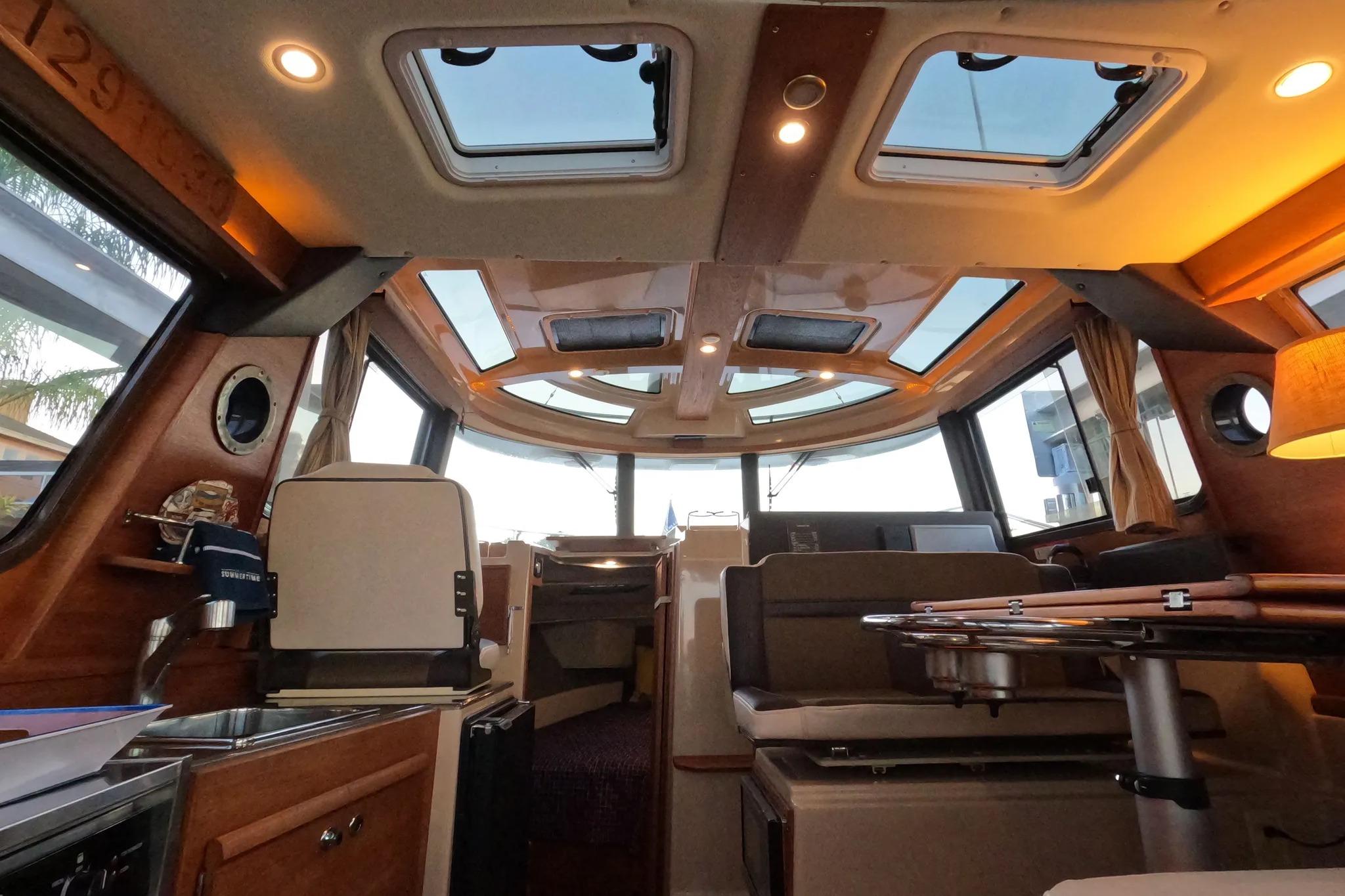 Interior of 2015 Ranger Tugs R-29 S boat with modern design and skylights.