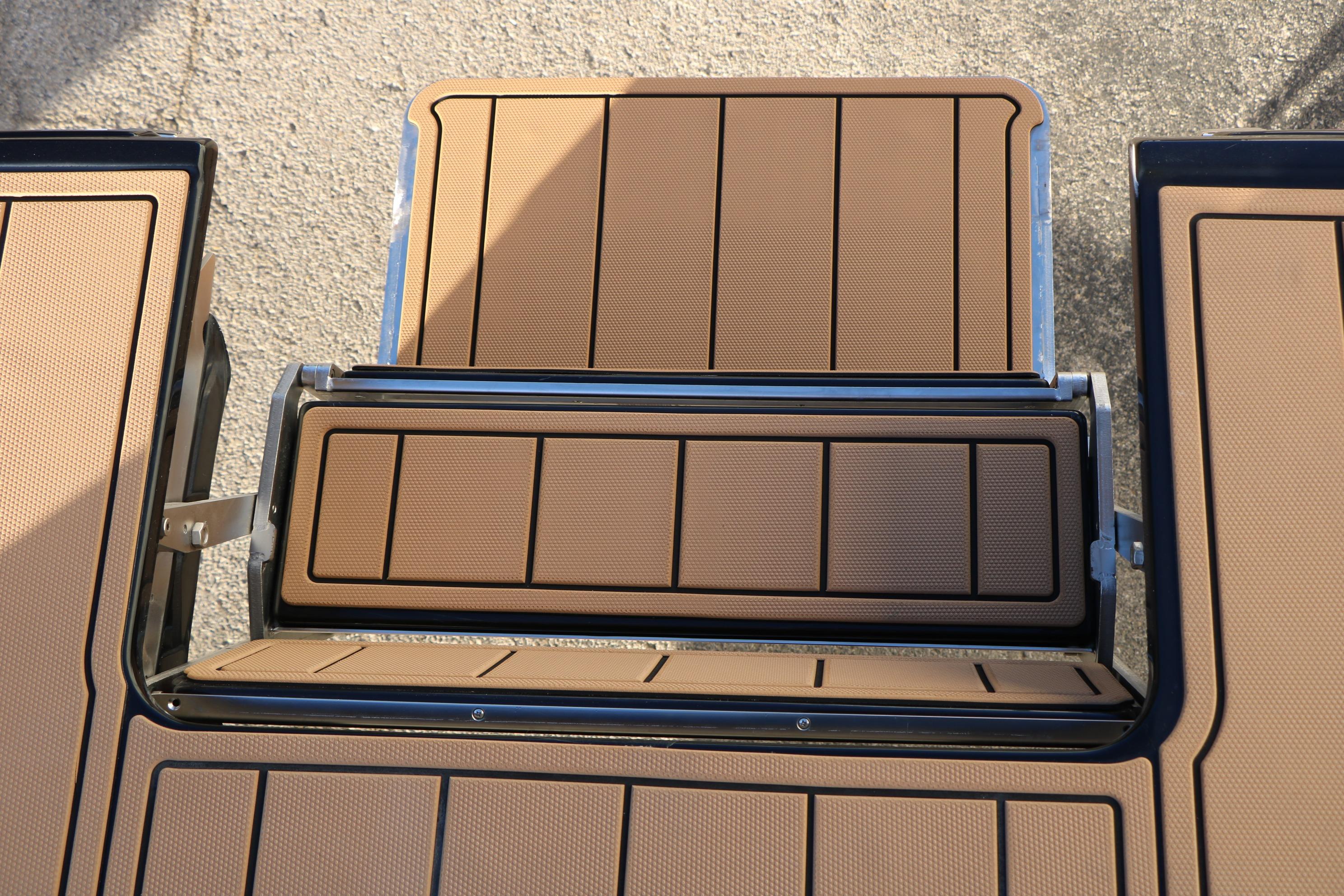 2026 Chaparral 247 SSX boat deck with brown textured panels.