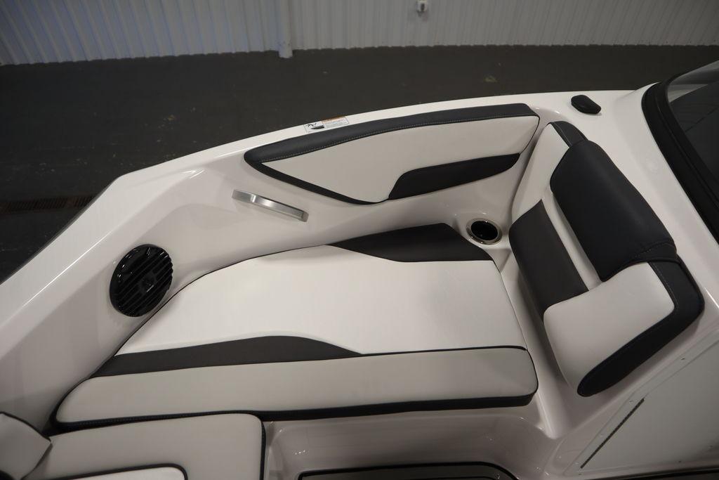 Luxurious seating in 2026 Yamaha Boats 195S, featuring sleek black and white upholstery.