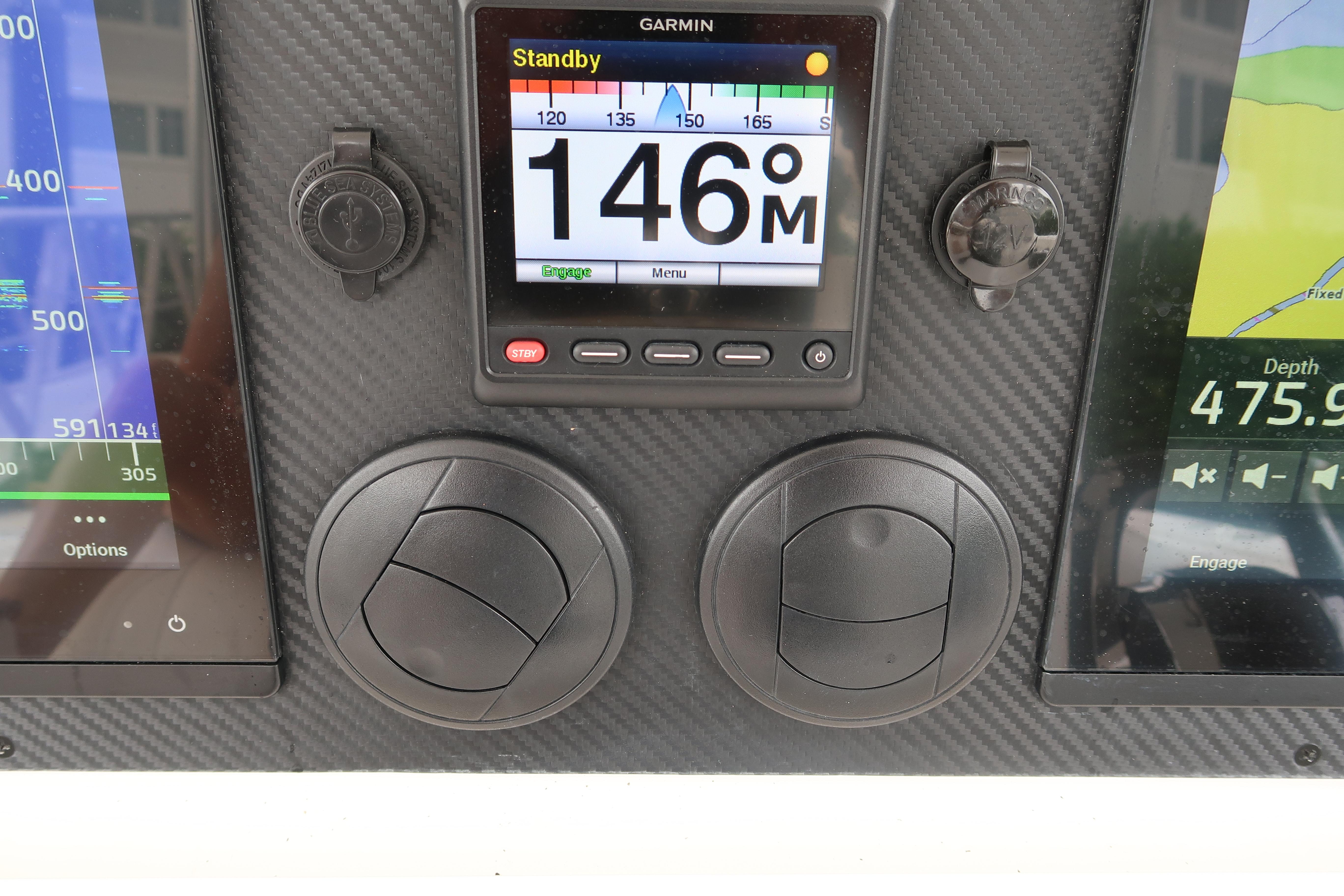 Dashboard of a 2016 Invincible 42 Open Fisherman with Garmin navigation system.