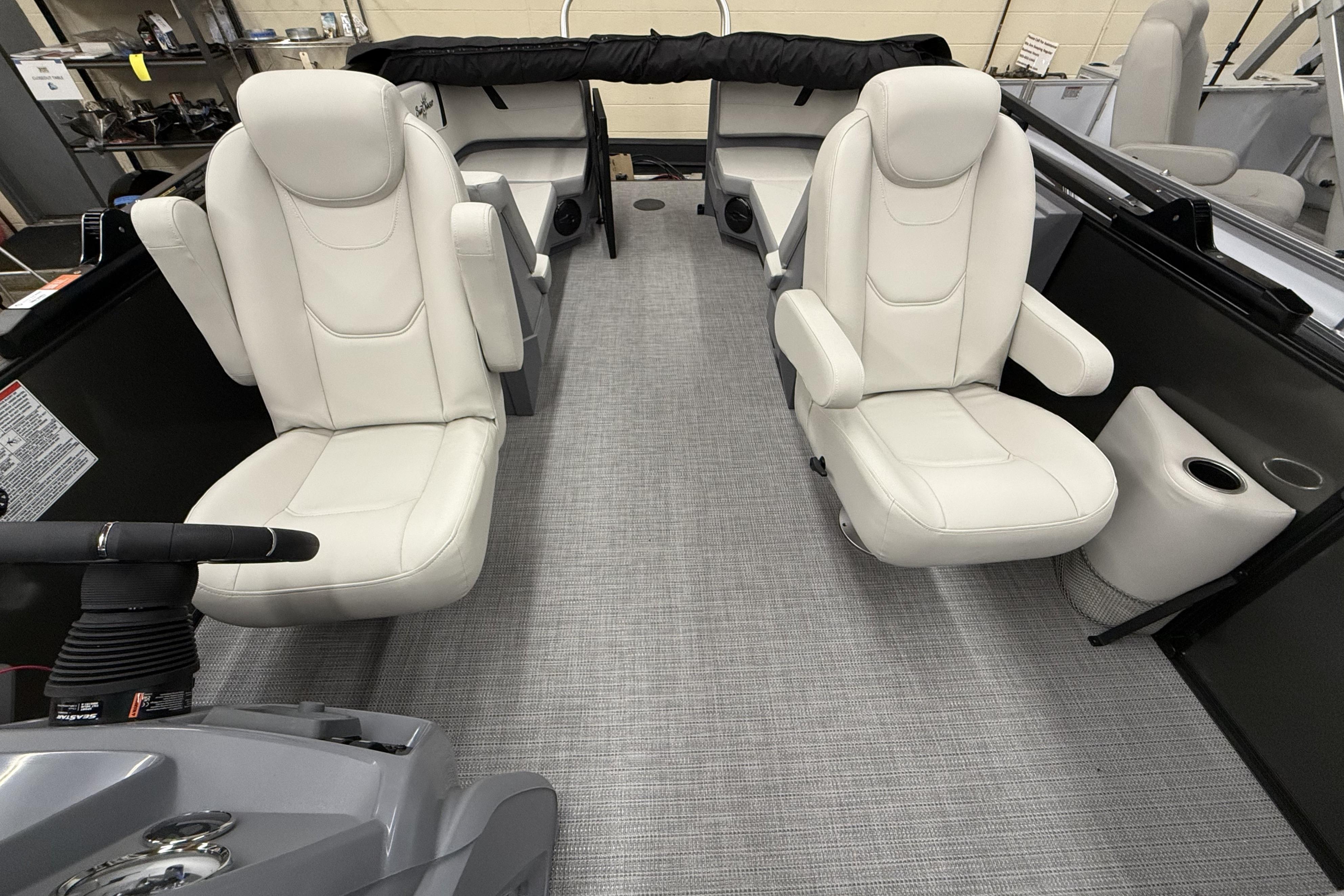 Interior of 2025 SunChaser Lucerne 22 LR DH pontoon boat with plush seating.