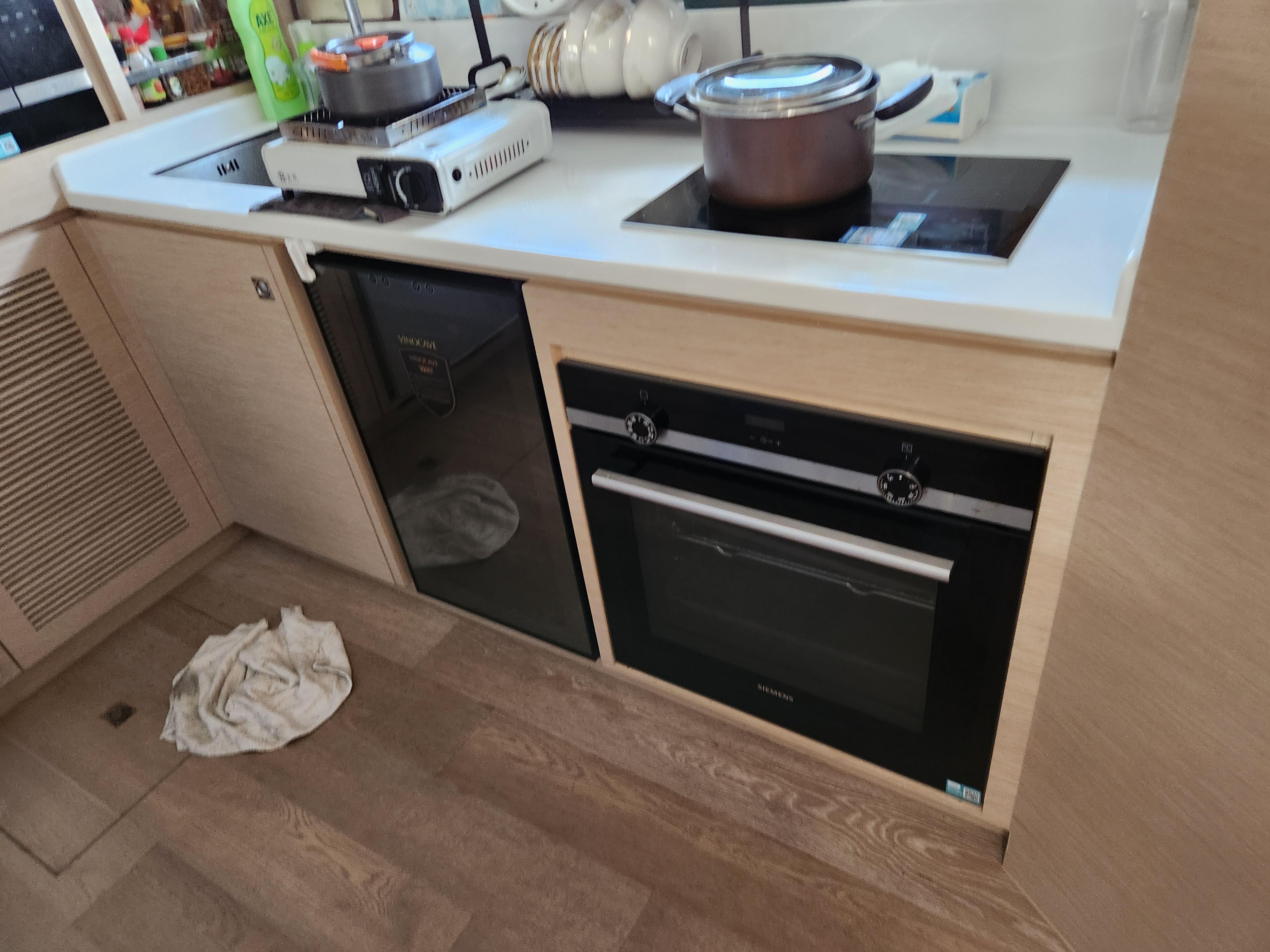 Modern kitchen in 2025 Heysea Seaview 56 yacht with stove and oven.