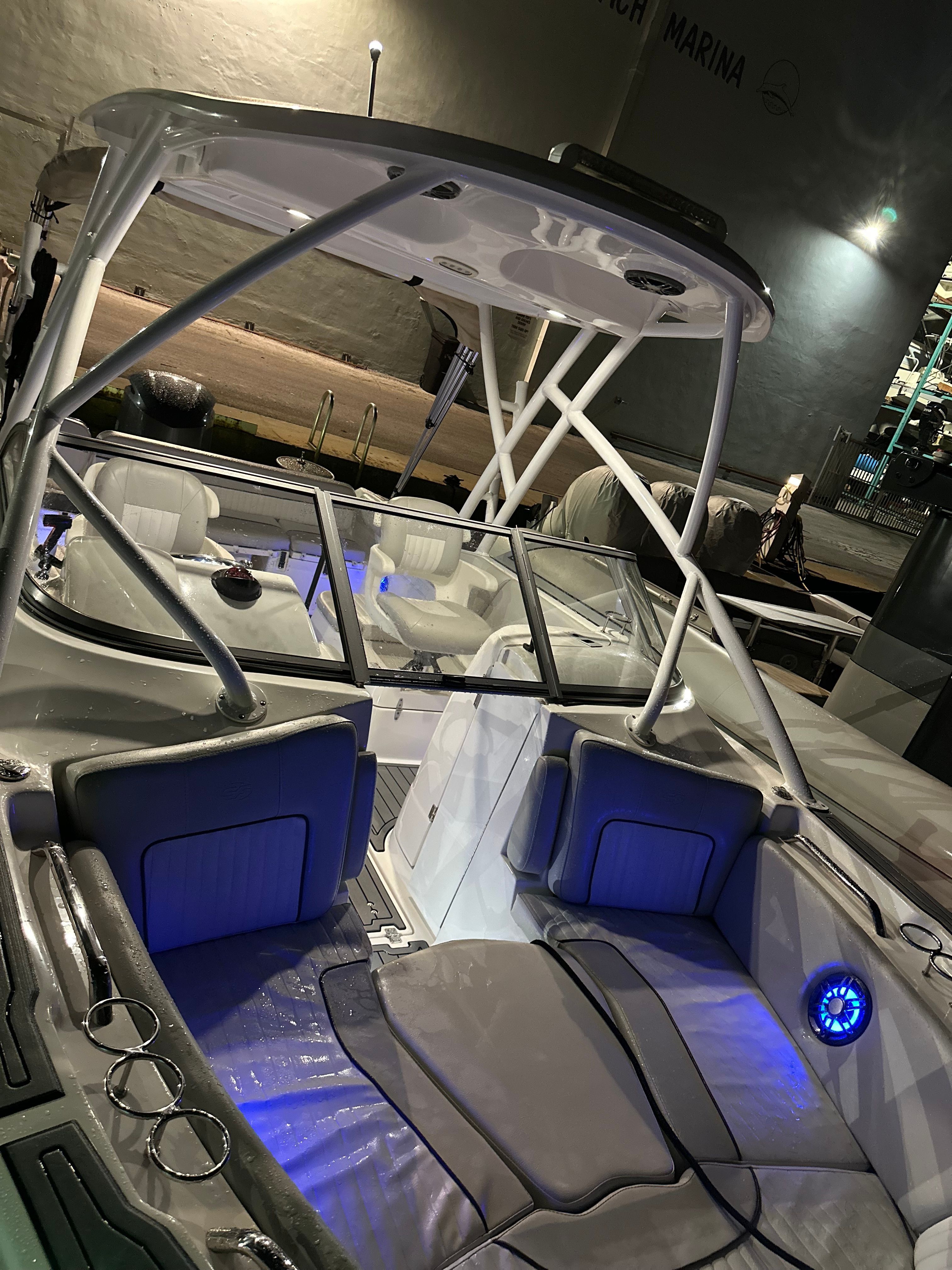 Interior view of a 2021 Sea Fox 226 Traveler boat at night.