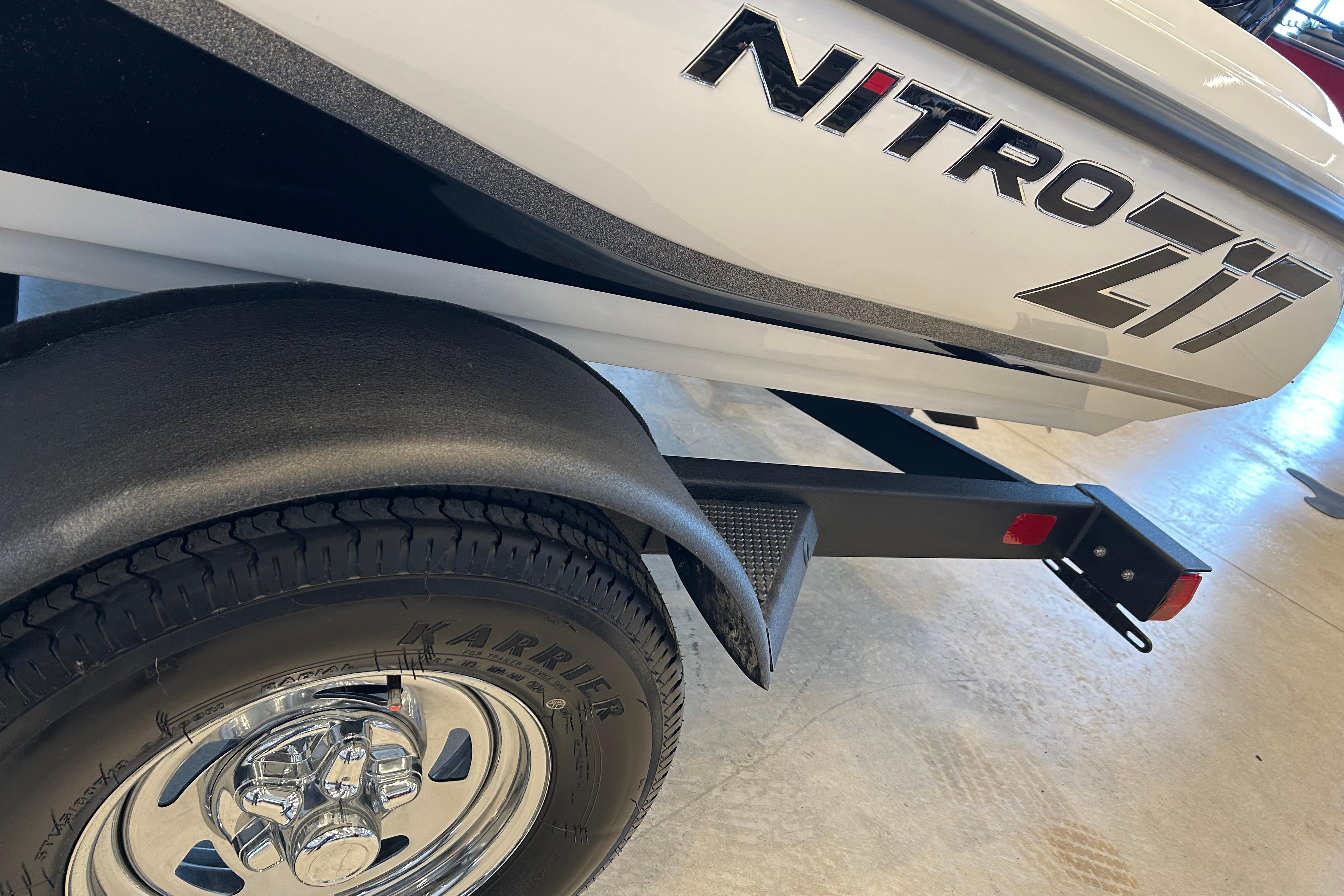 2026 Nitro Z17 boat trailer with Karrie tire, showcasing sleek design and branding.