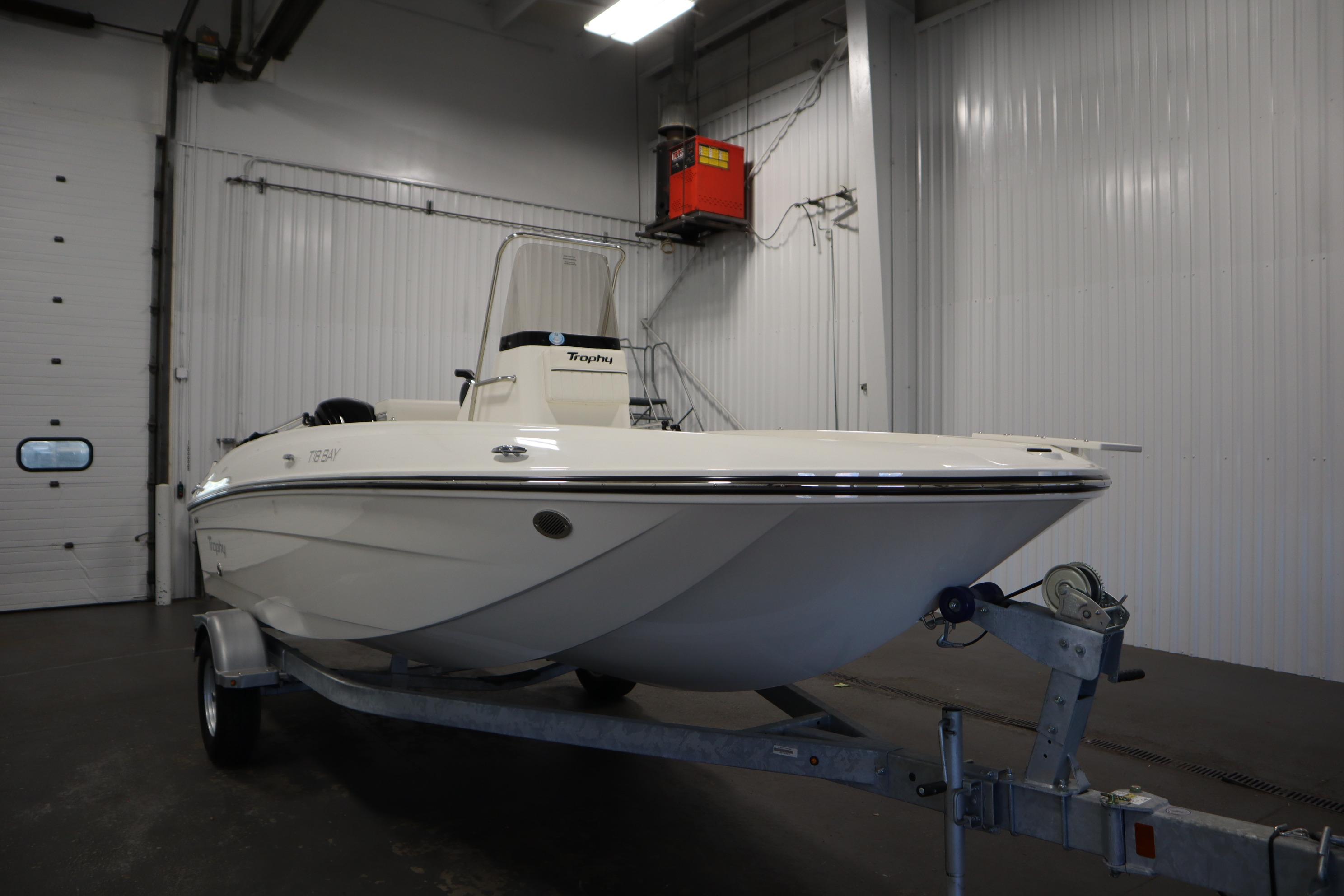 2026 Bayliner Trophy T18 boat on trailer in indoor storage facility.
