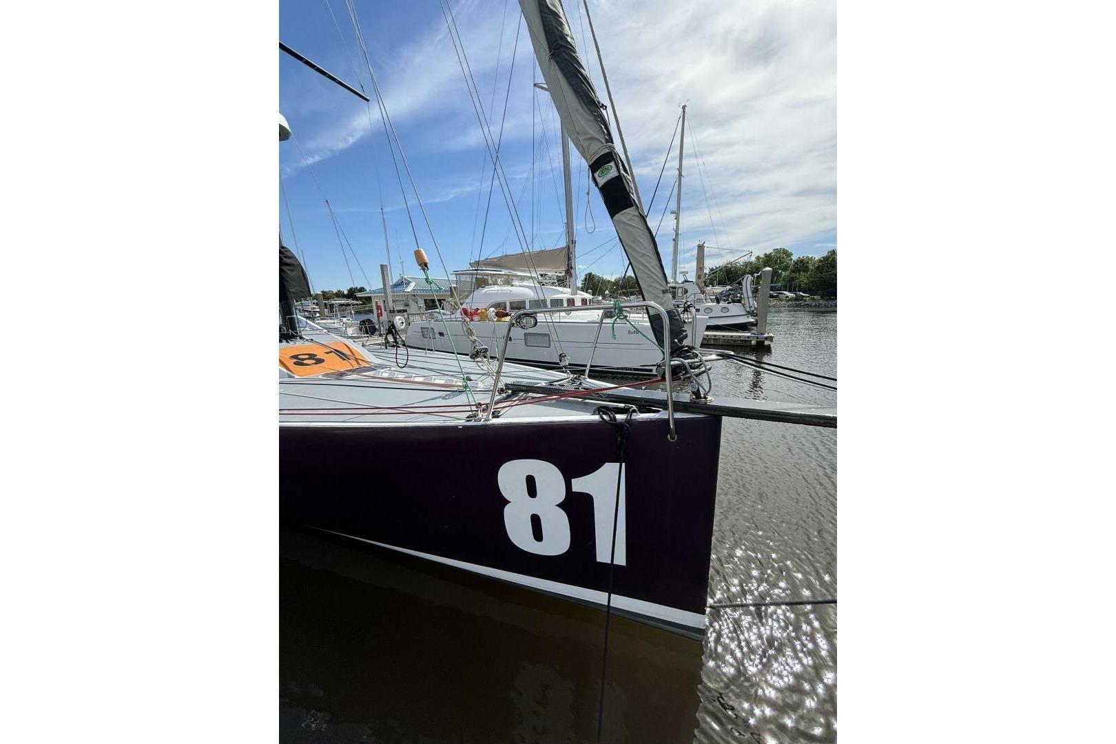 Sailboat Class 40 Akilaria RC2, 2009 model, docked with number 81 visible.