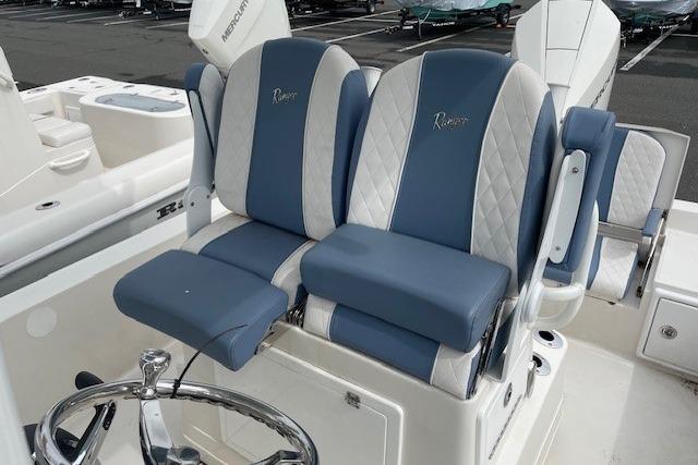 Interior of 2025 Ranger 2360 Bay with blue seating.