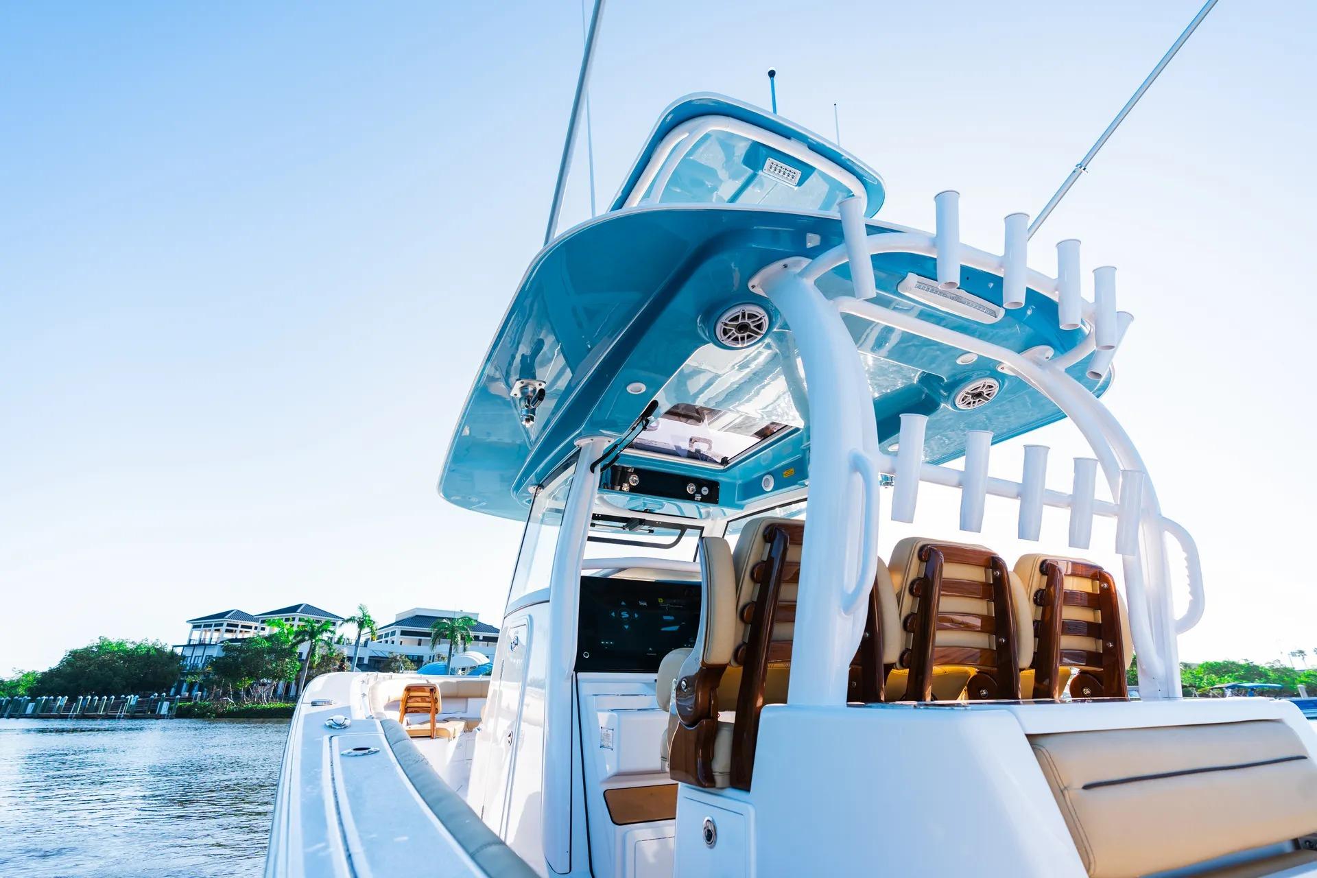 2026 Sportsman Open 352 Center Console boat on calm water, showcasing sleek design.