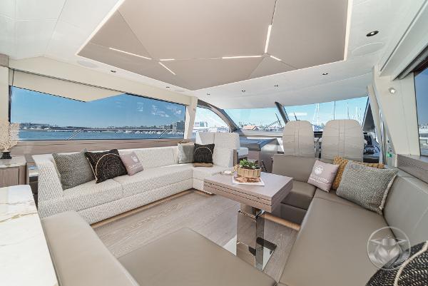 Luxurious interior of 2025 Sunseeker Manhattan 68 yacht with modern seating and panoramic views.