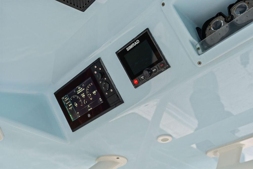 2021 Yellowfin 36 Offshore boat dashboard with Simrad navigation system.