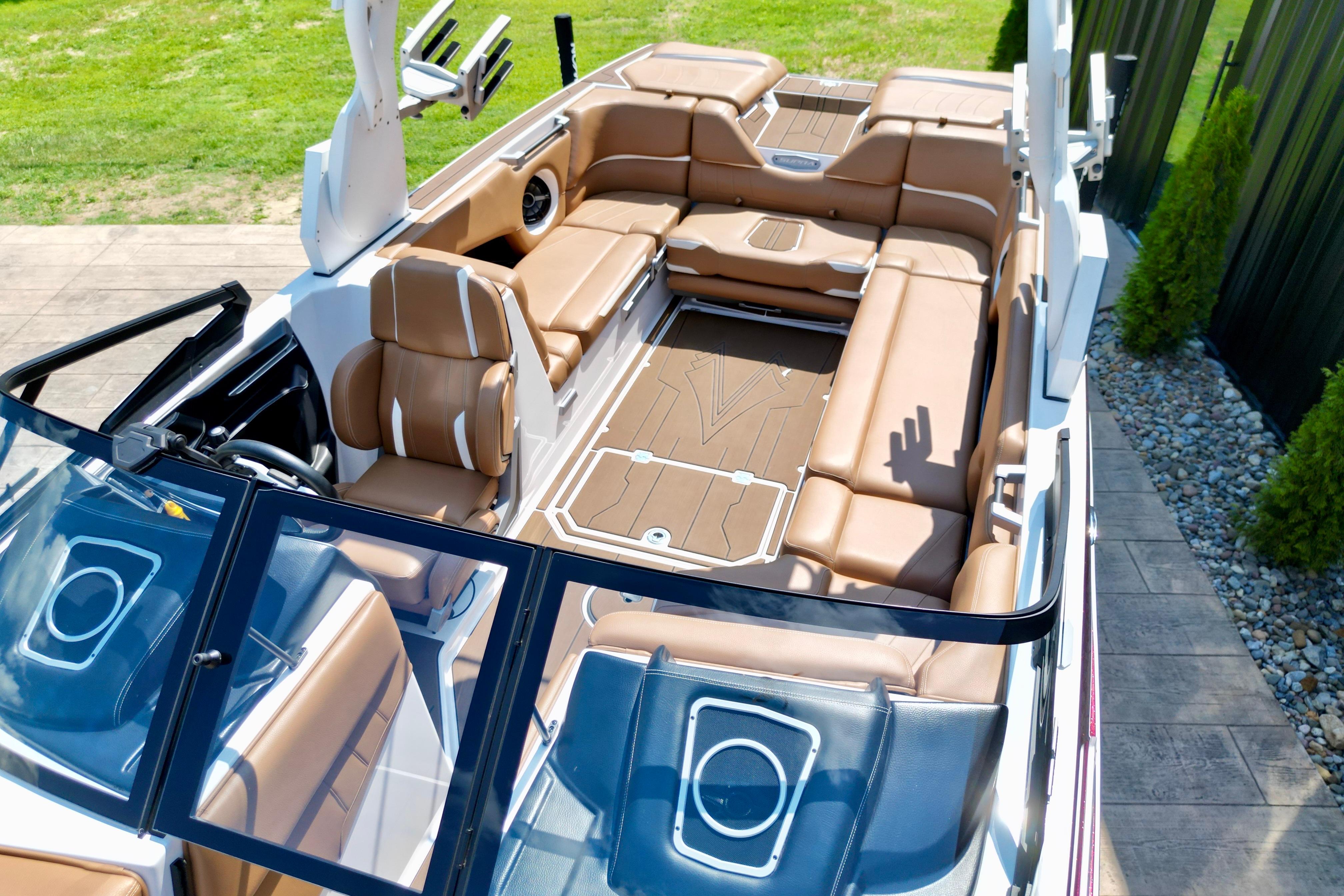 2021 Supra SE boat interior with luxurious tan seating and modern design.
