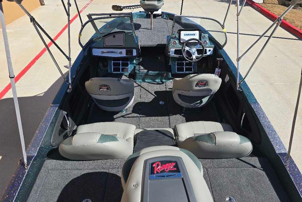 2026 Ranger 212LS boat interior with seating and steering console.