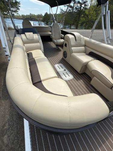 2022 Premier 250 Solaris pontoon boat with luxurious beige seating and spacious deck.
