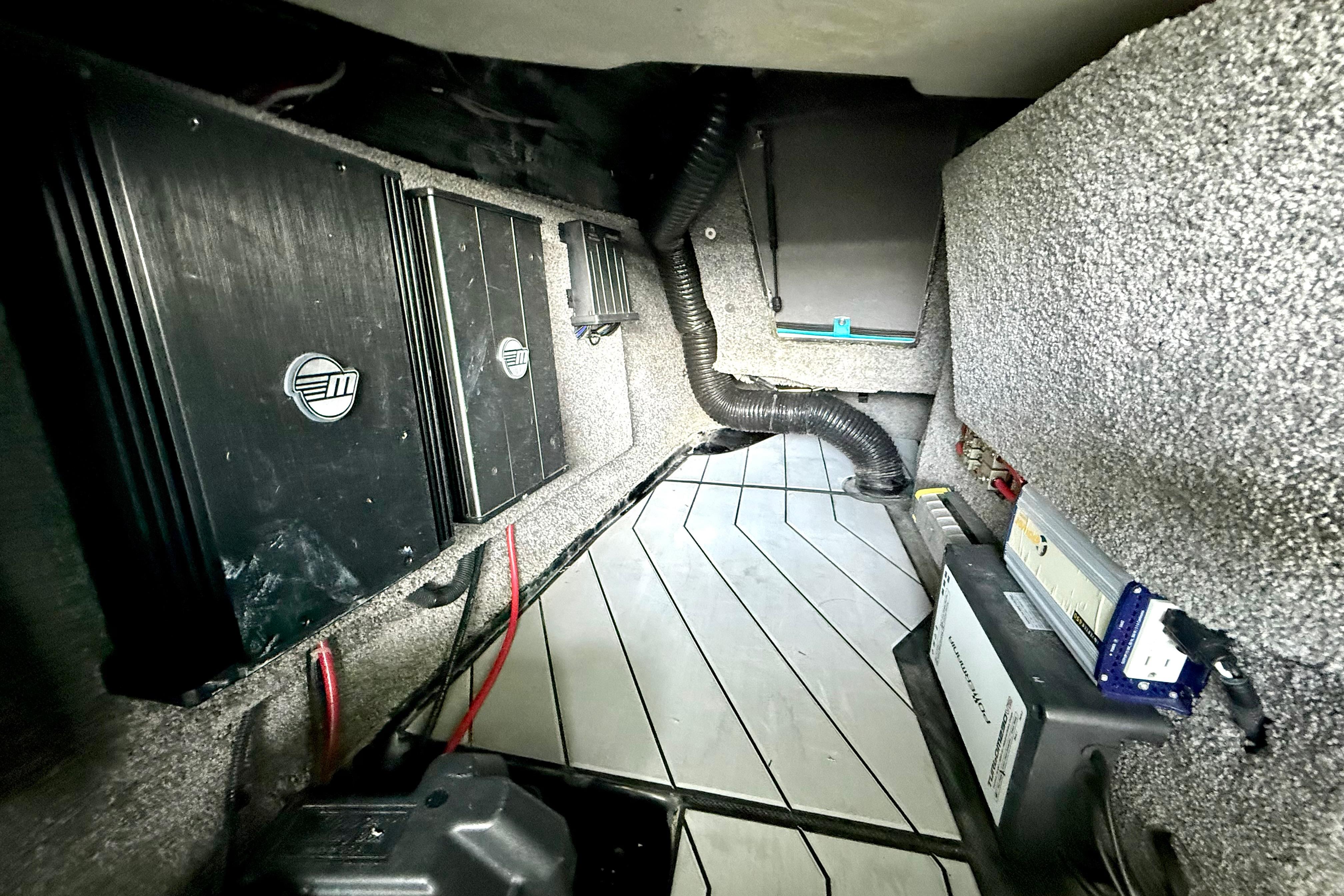 2017 Malibu M235 boat interior showing electronic components and wiring setup.