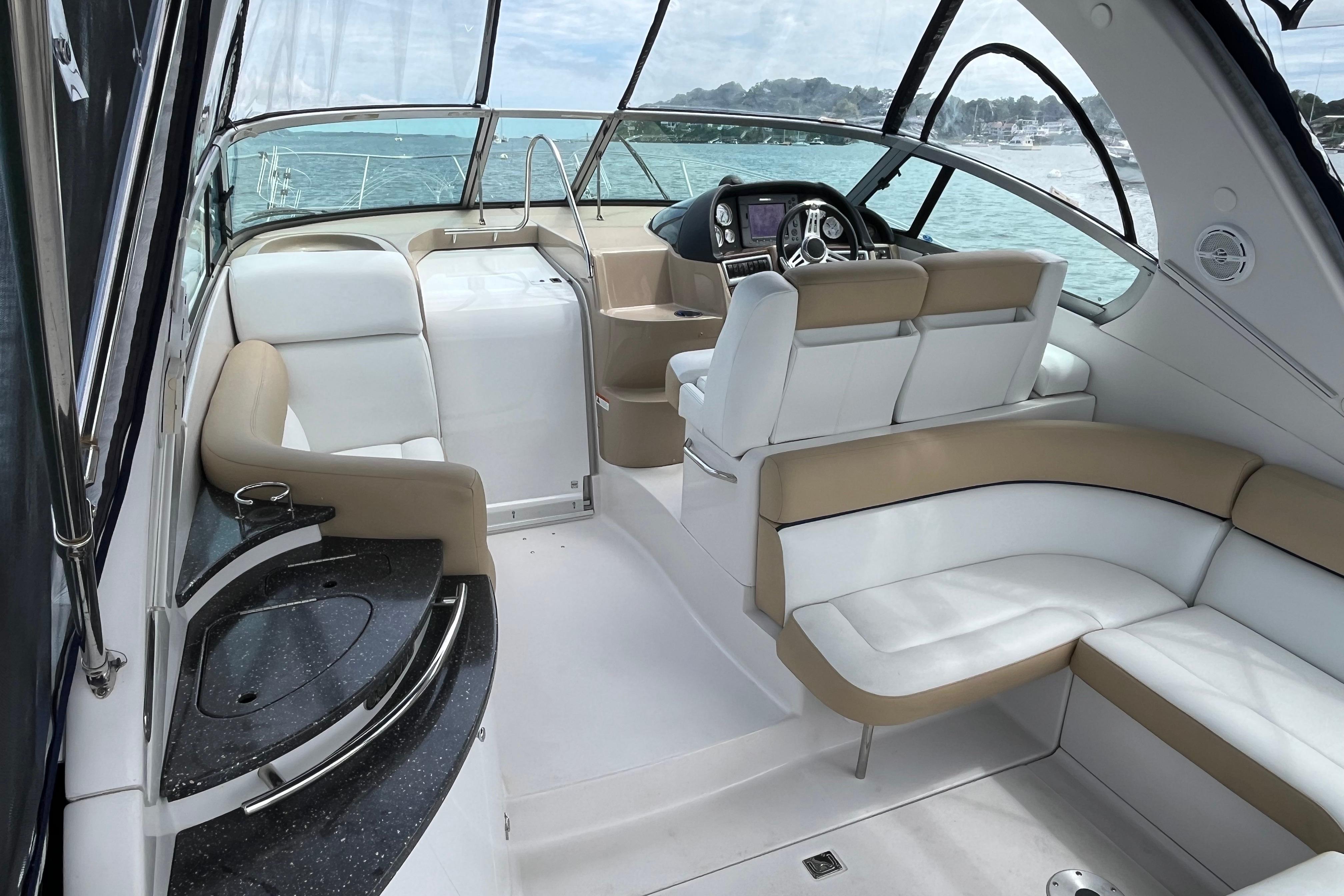2008 Four Winns 338 Vista yacht interior with white and beige seating, sleek design.
