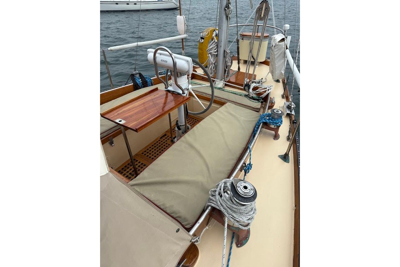 1962 Ted Hood Little Harbor 40 Yawl deck with steering wheel and ropes.