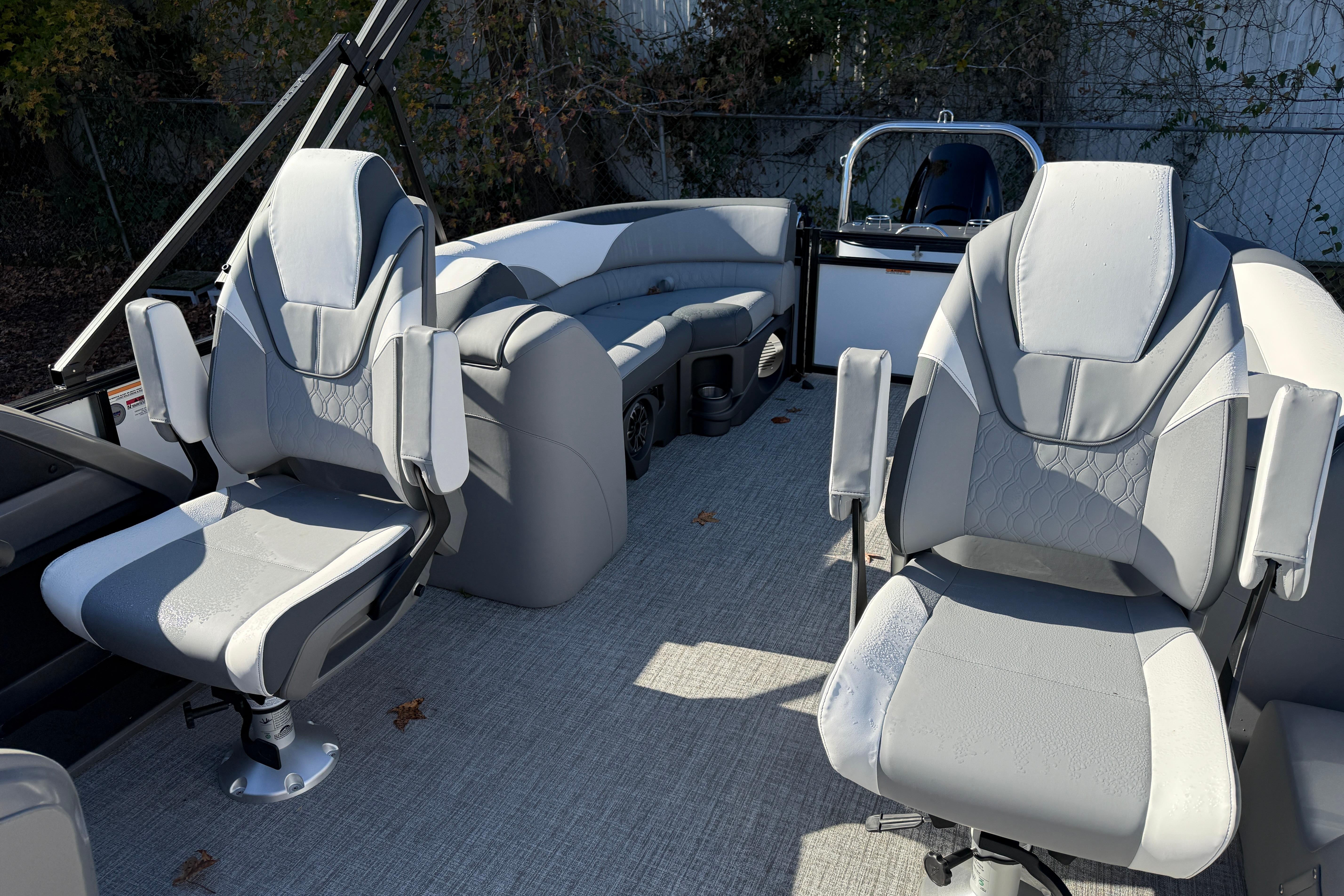 2026 Tahoe Pontoon LTZ Quad Lounger interior with plush seating and modern design.