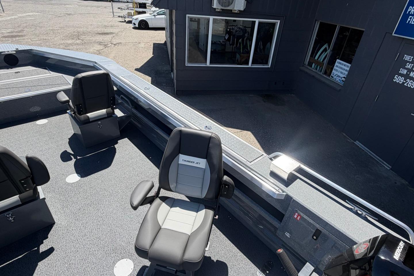 2026 Thunder Jet 209 Rush OT boat interior with seating and control panel.