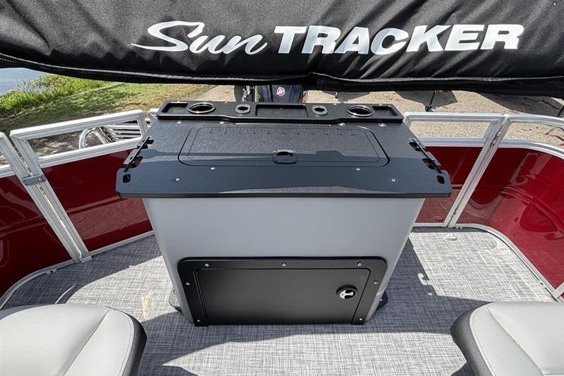 2026 Sun Tracker SportFish 20 DLX boat interior with seating and storage area.