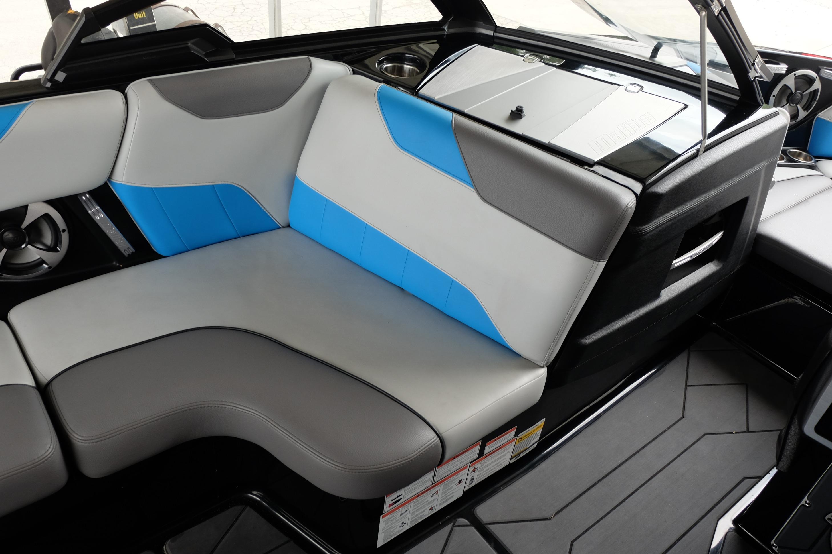 2020 Malibu Wakesetter 23 LSV interior with gray and blue seating, modern design.