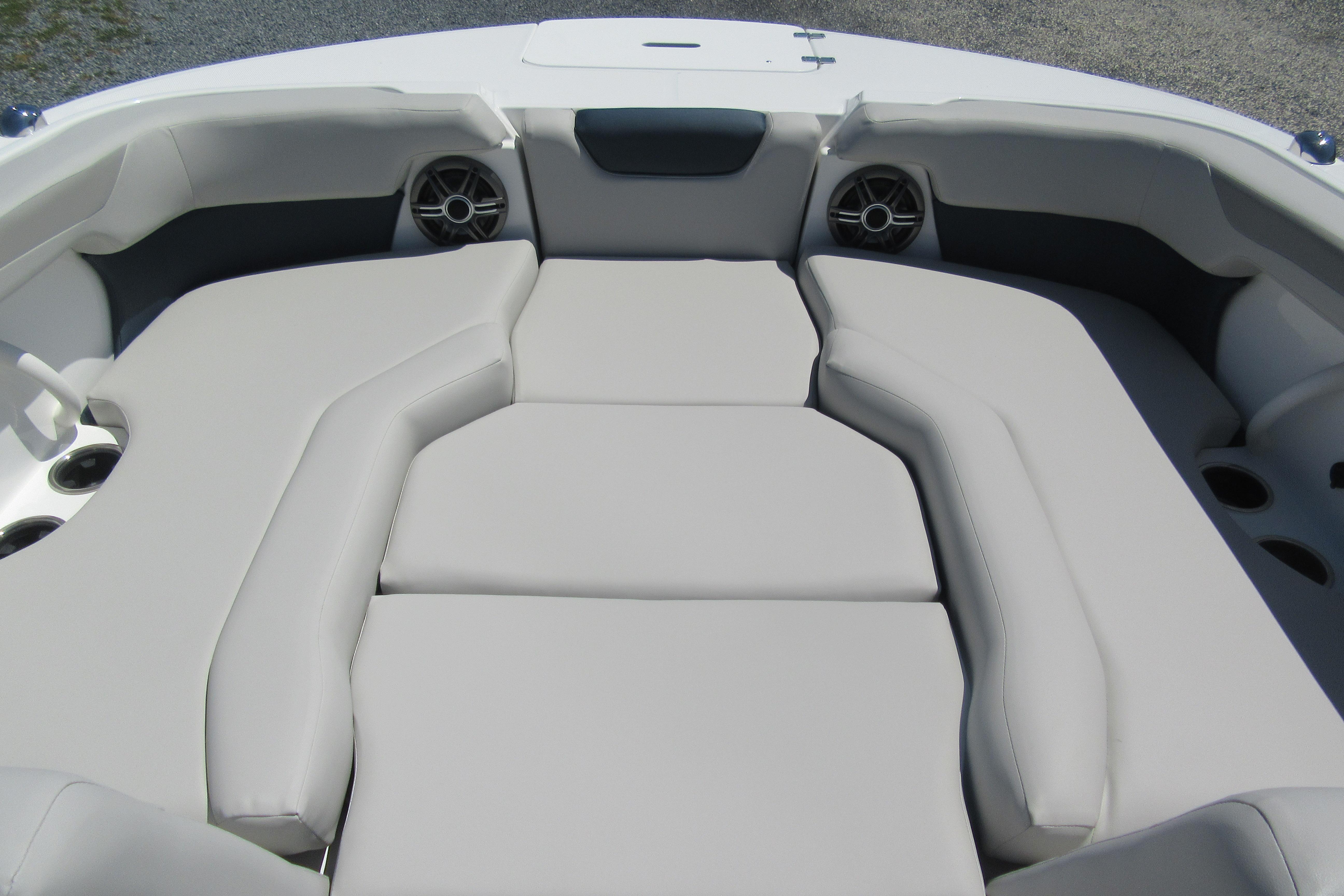Interior seating of 2027 Hurricane SunDeck 2050 OB boat with cushioned layout.
