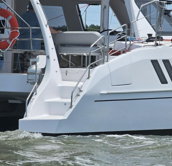 2025 Seawind 1160 XL catamaran on water, featuring sleek design and modern amenities.