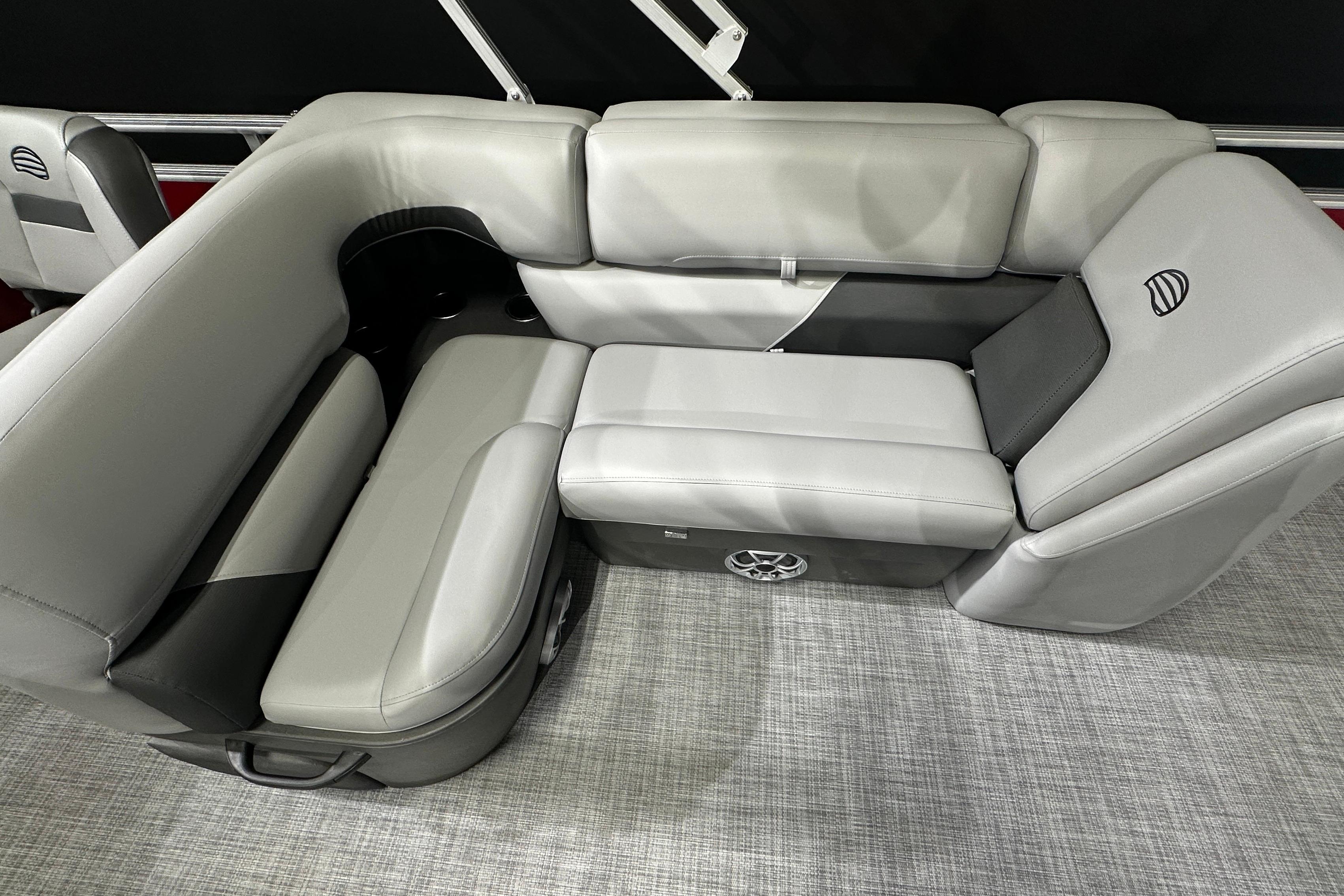 2026 Sun Tracker SportFish 22 DLX interior seating, featuring sleek gray upholstery and modern design.