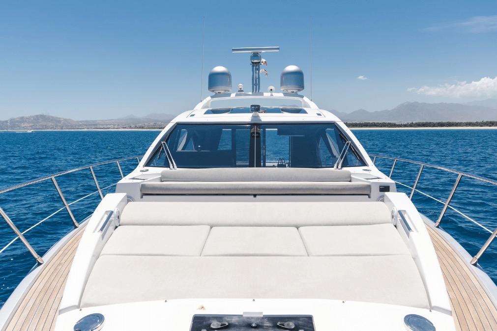 Luxury Azimut 60 yacht cruising on clear blue waters, 2020 model.