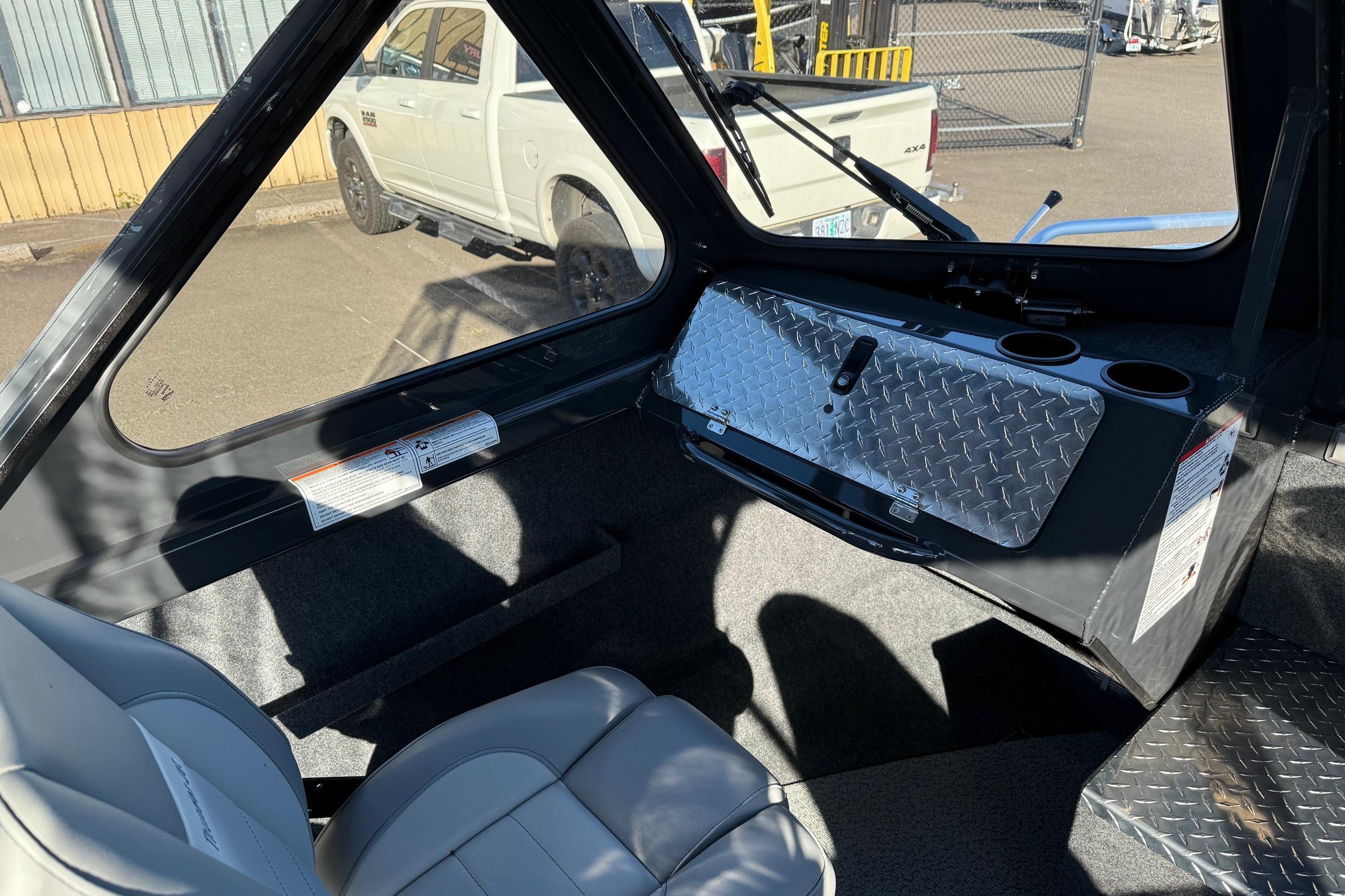 Interior of 2026 Thunder Jet 200 Luxor boat with diamond plate accents and seating.