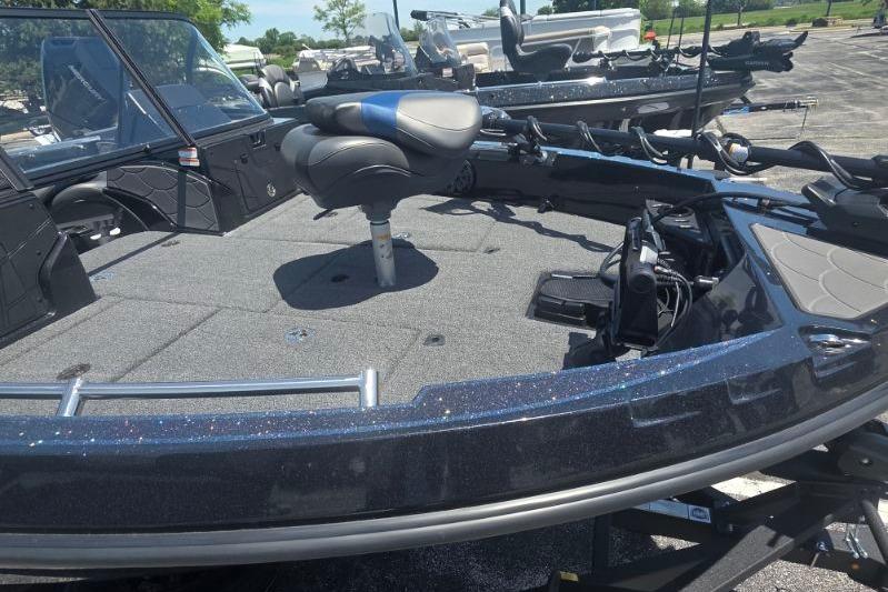 2026 Nitro ZV20 Pro boat with spacious deck and seating, parked outdoors.