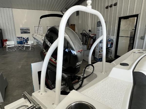 2025 Stingray 172SC boat with Yamaha 90 engine in showroom.