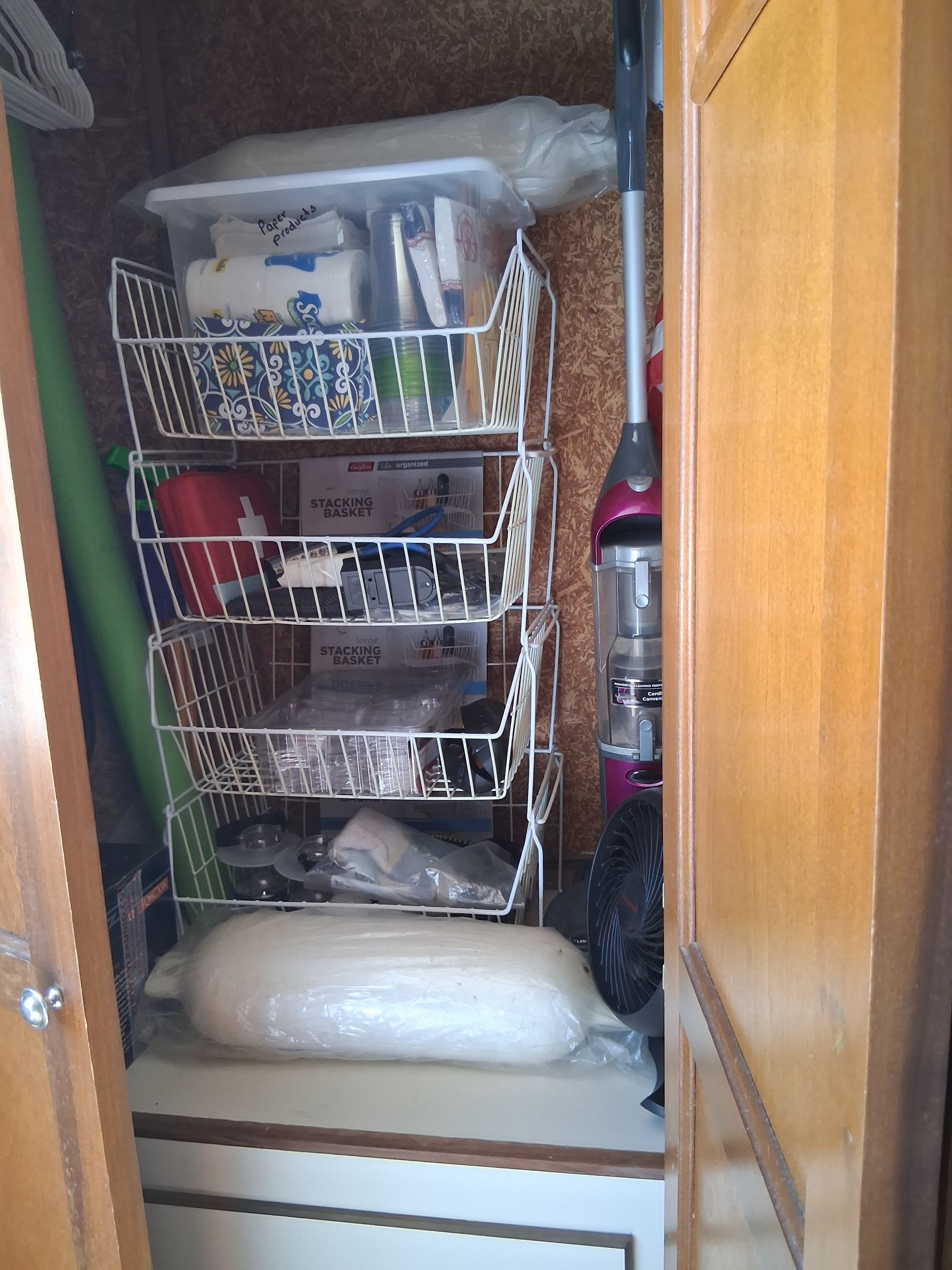 Storage area with shelves and household items