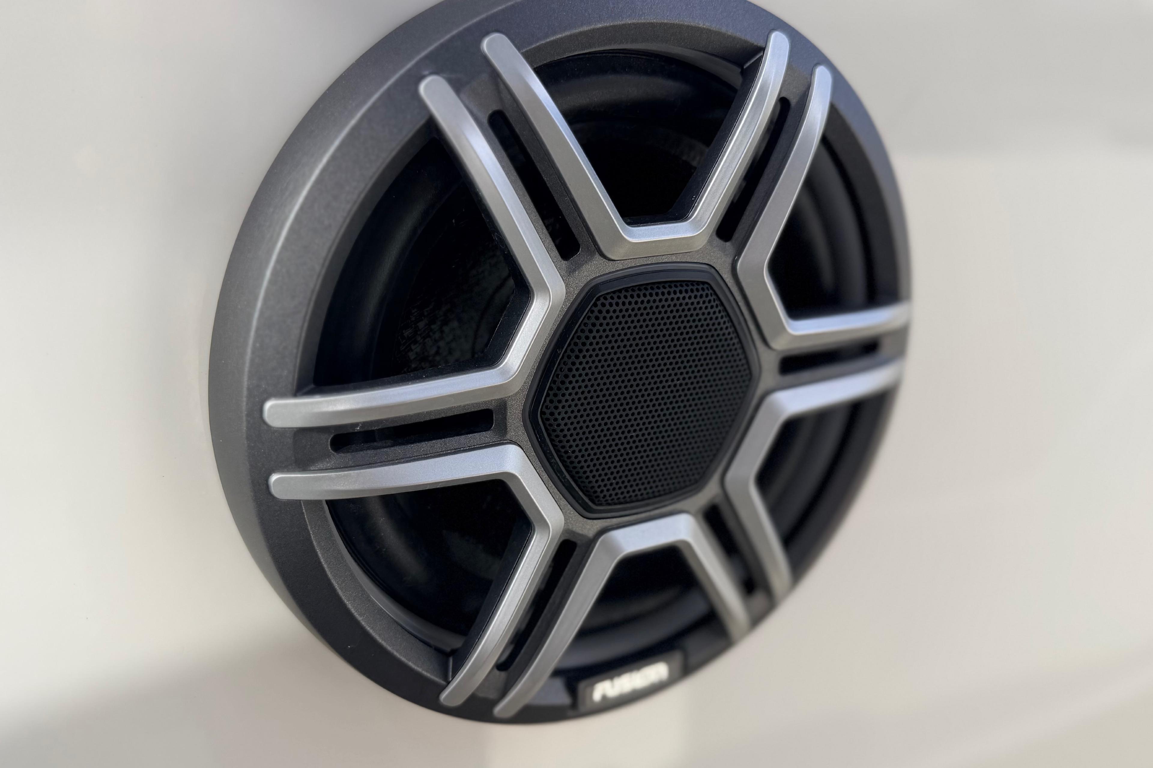 Close-up of a Navan S30 speaker grille, 2026 model, featuring a sleek metallic design.