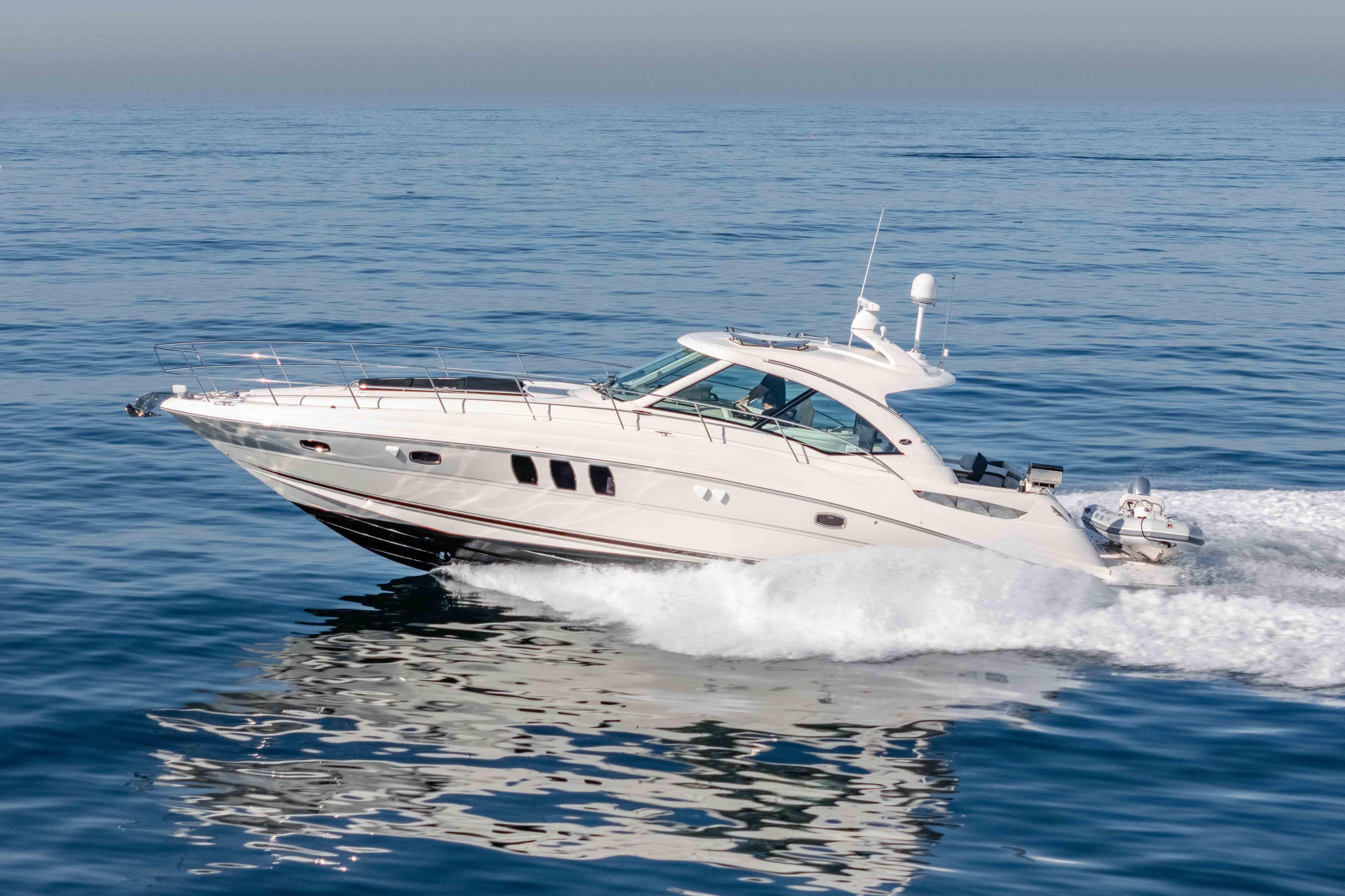 2007 Sea Ray 48 Sundancer yacht cruising on open water.