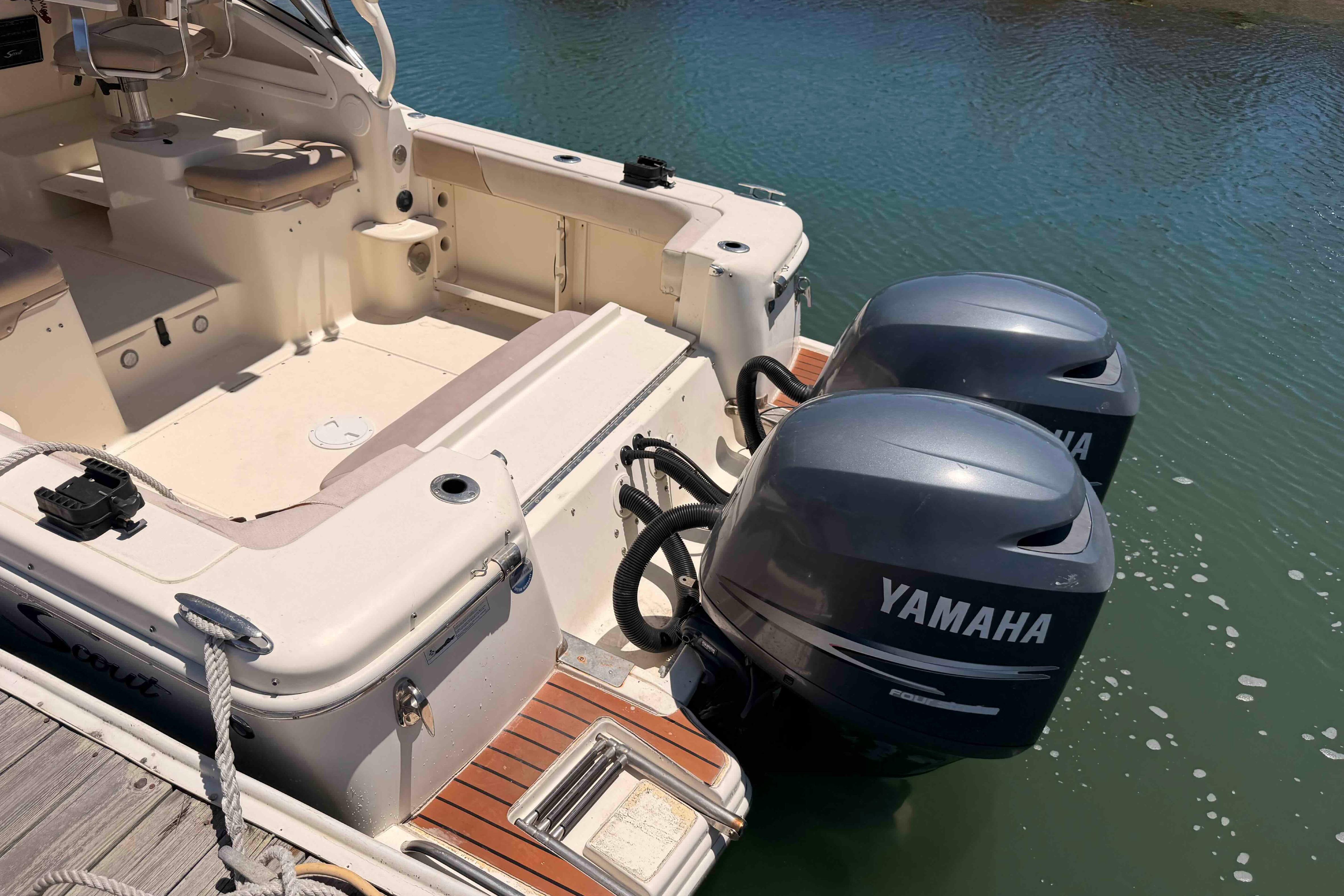 2007 Scout 262 Abaco boat with dual Yamaha outboard motors on calm water.