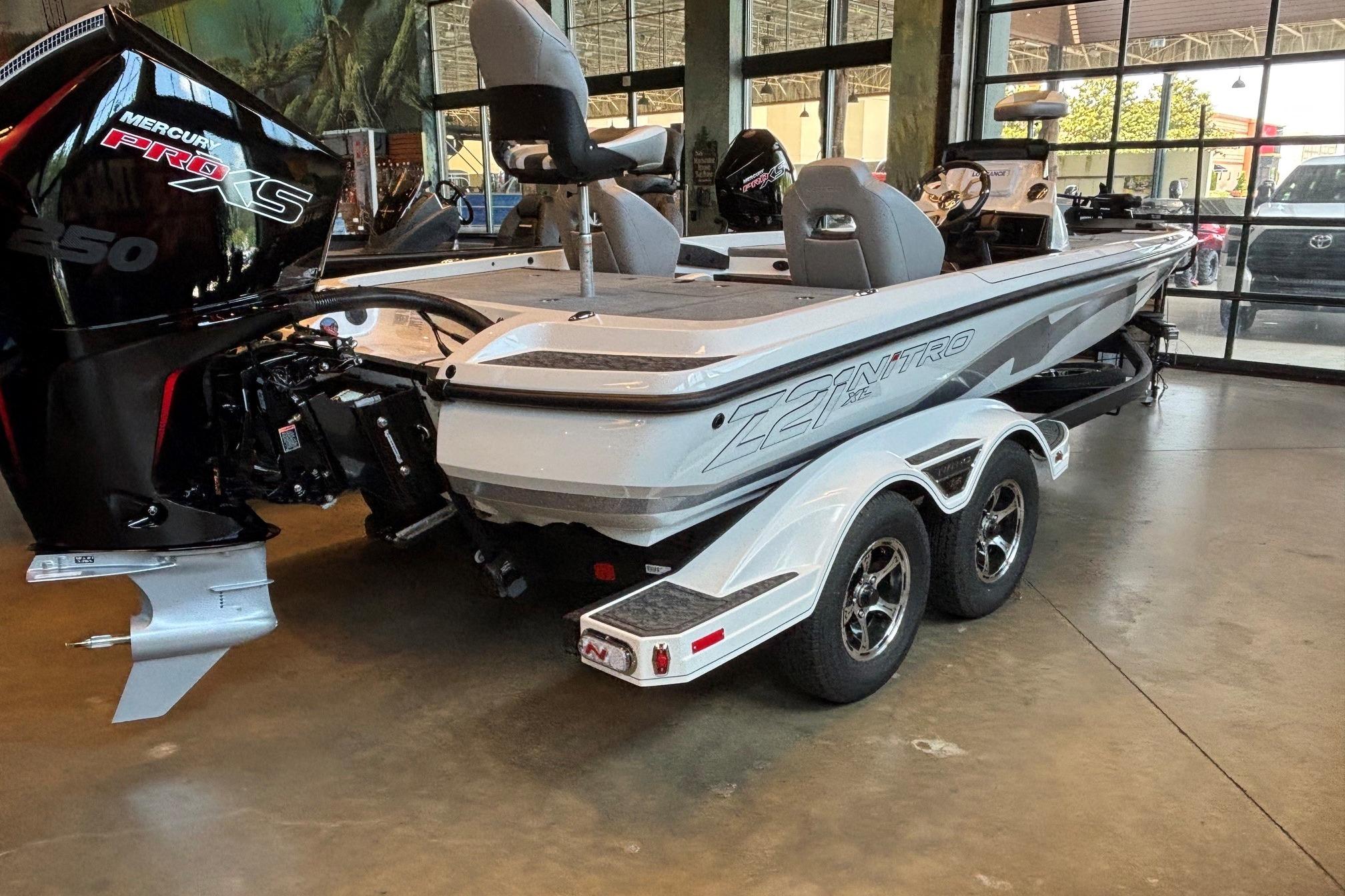 2026 Nitro Z21 XL boat with Mercury Pro XS engine on display indoors.