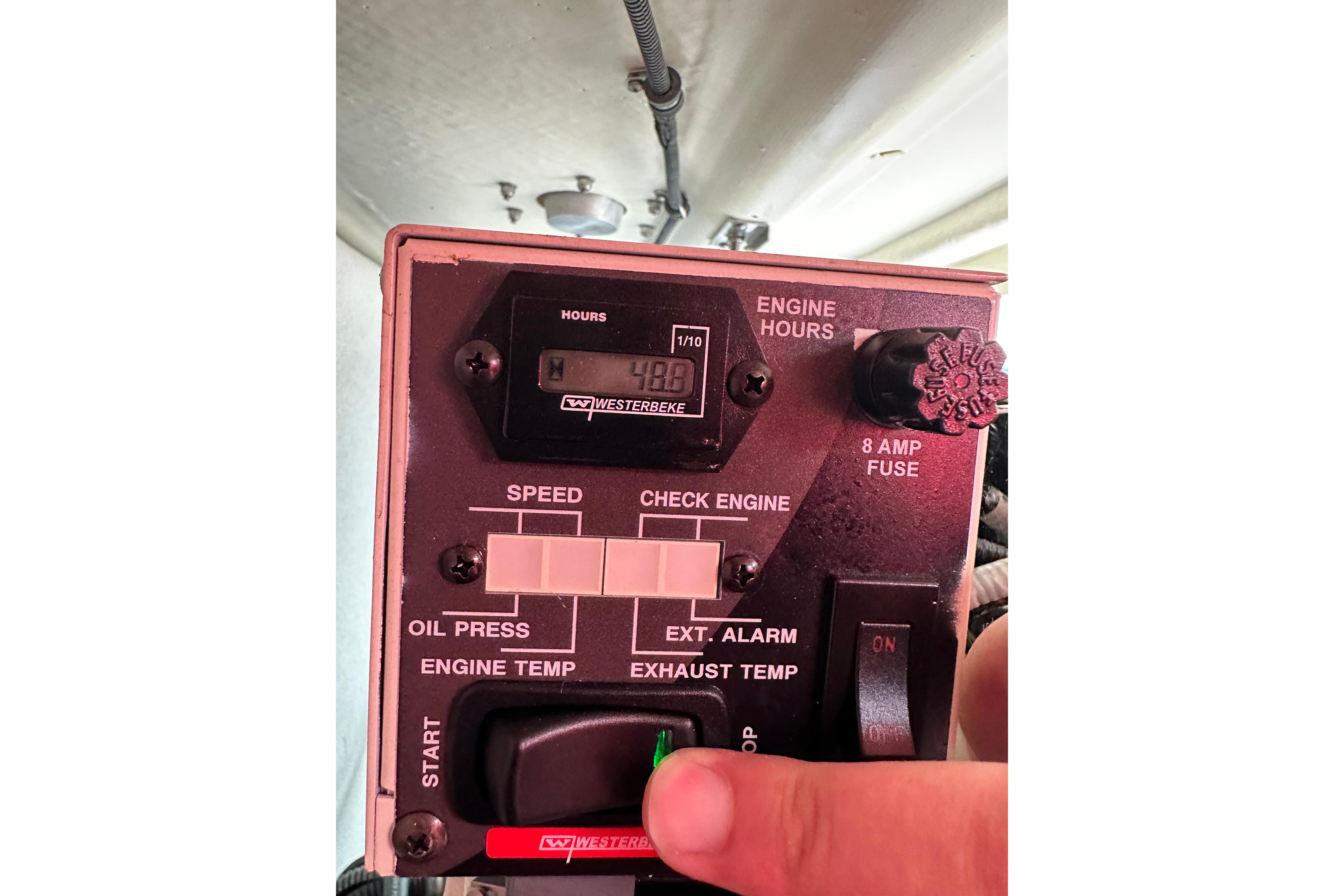 Control panel of a 2021 Formula 380 Super Sport Crossover OB showing engine hours and settings.