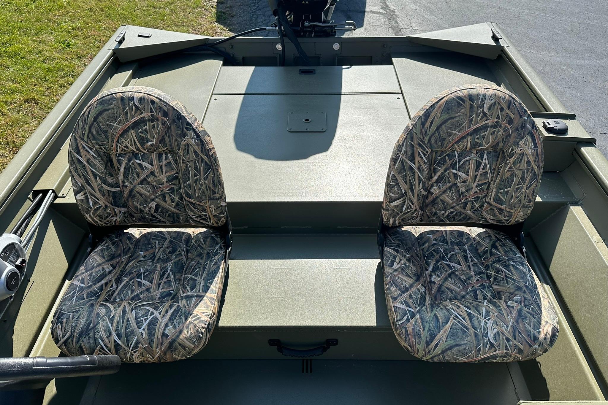 2026 Lowe Roughneck 1860SC boat with camo-patterned seats and spacious deck.