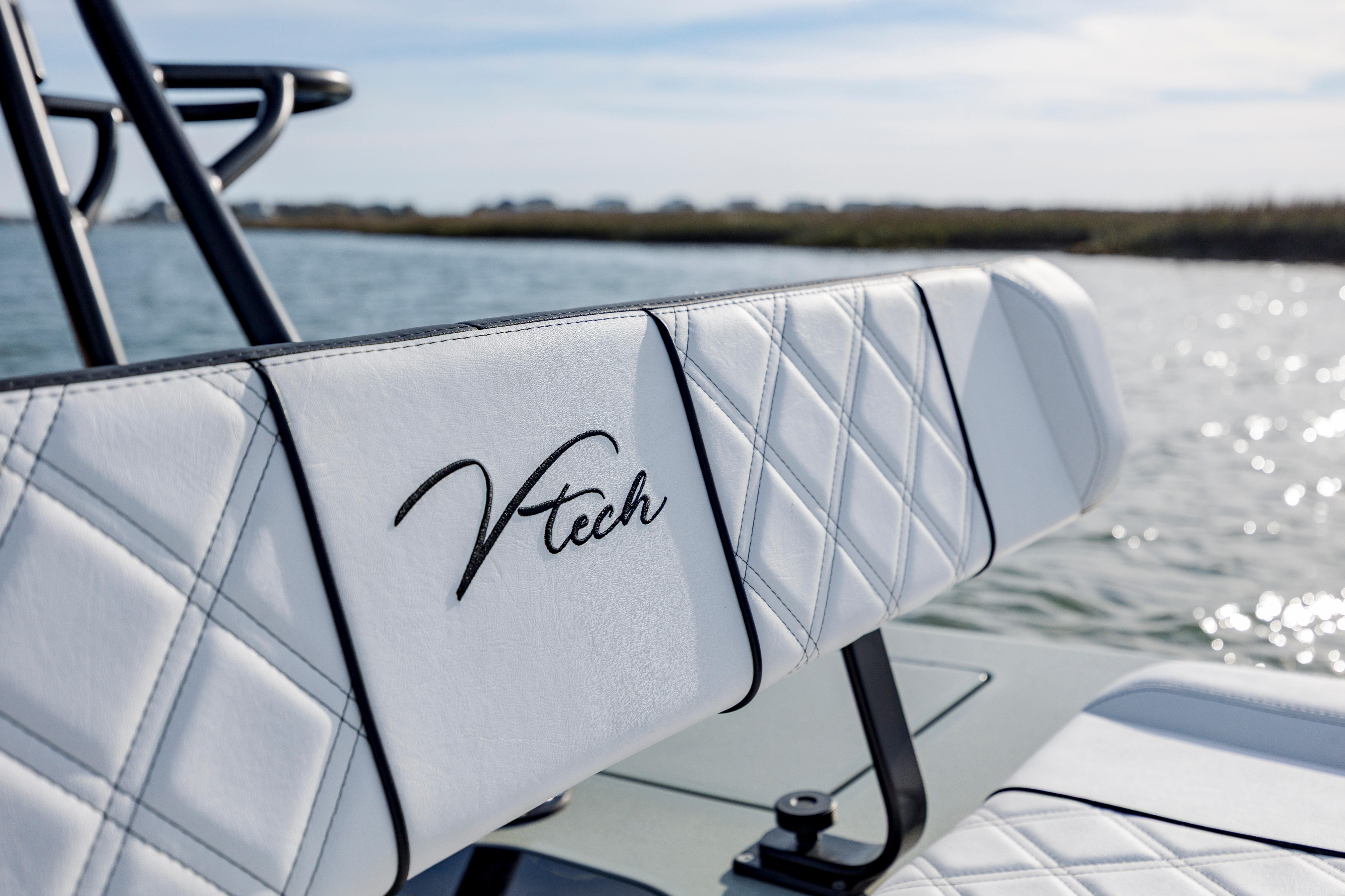 White Vtech 18 boat seat with diamond stitching, 2025 model, by the water.