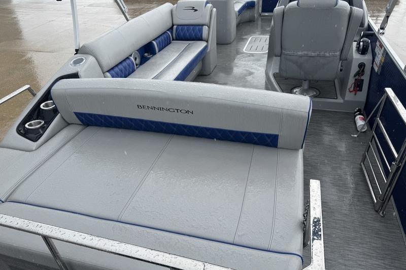 2022 Bennington 26 LXSB boat interior with gray and blue seating.