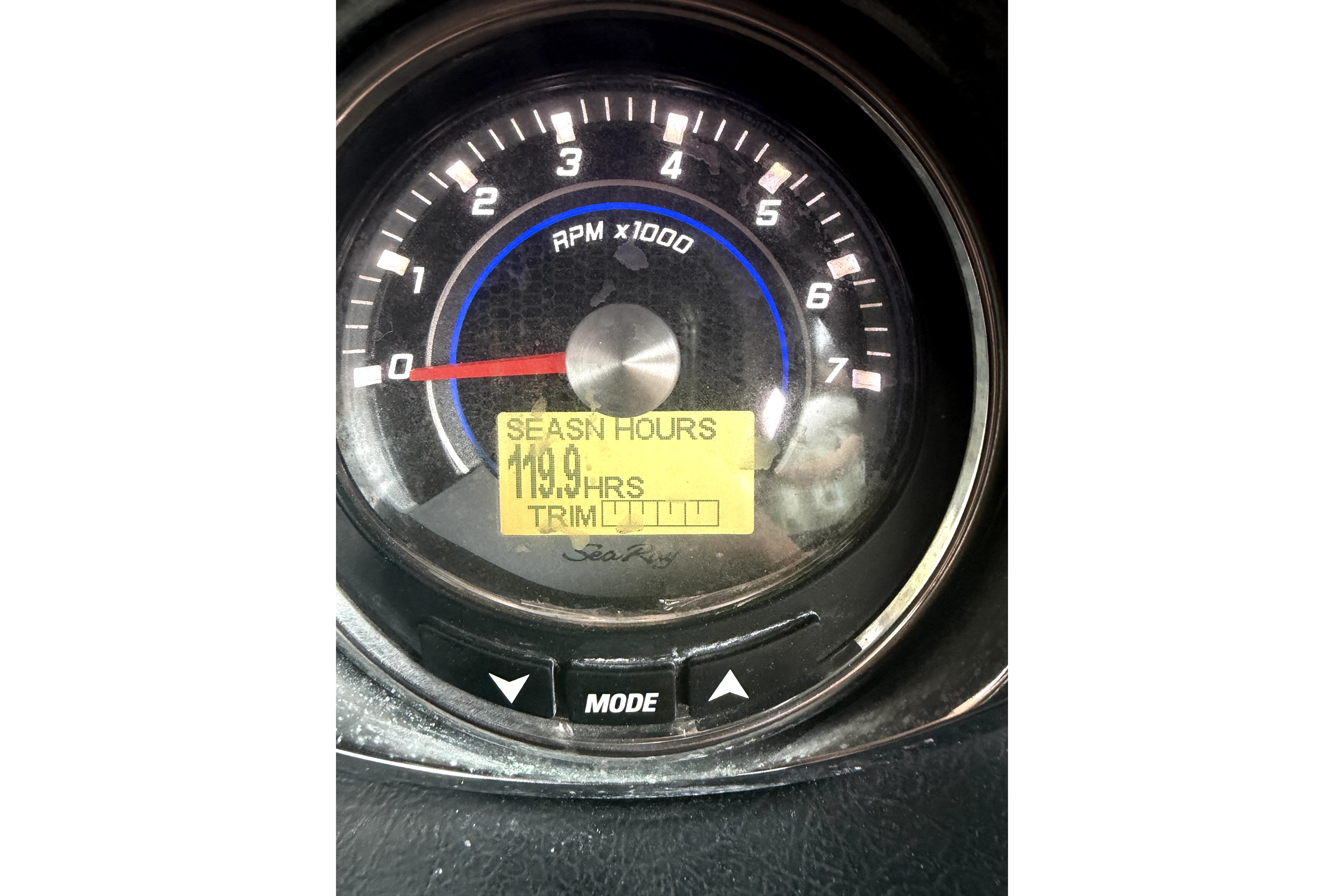 Tachometer of 2014 Sea Ray 260 Sundeck showing 119.9 engine hours.