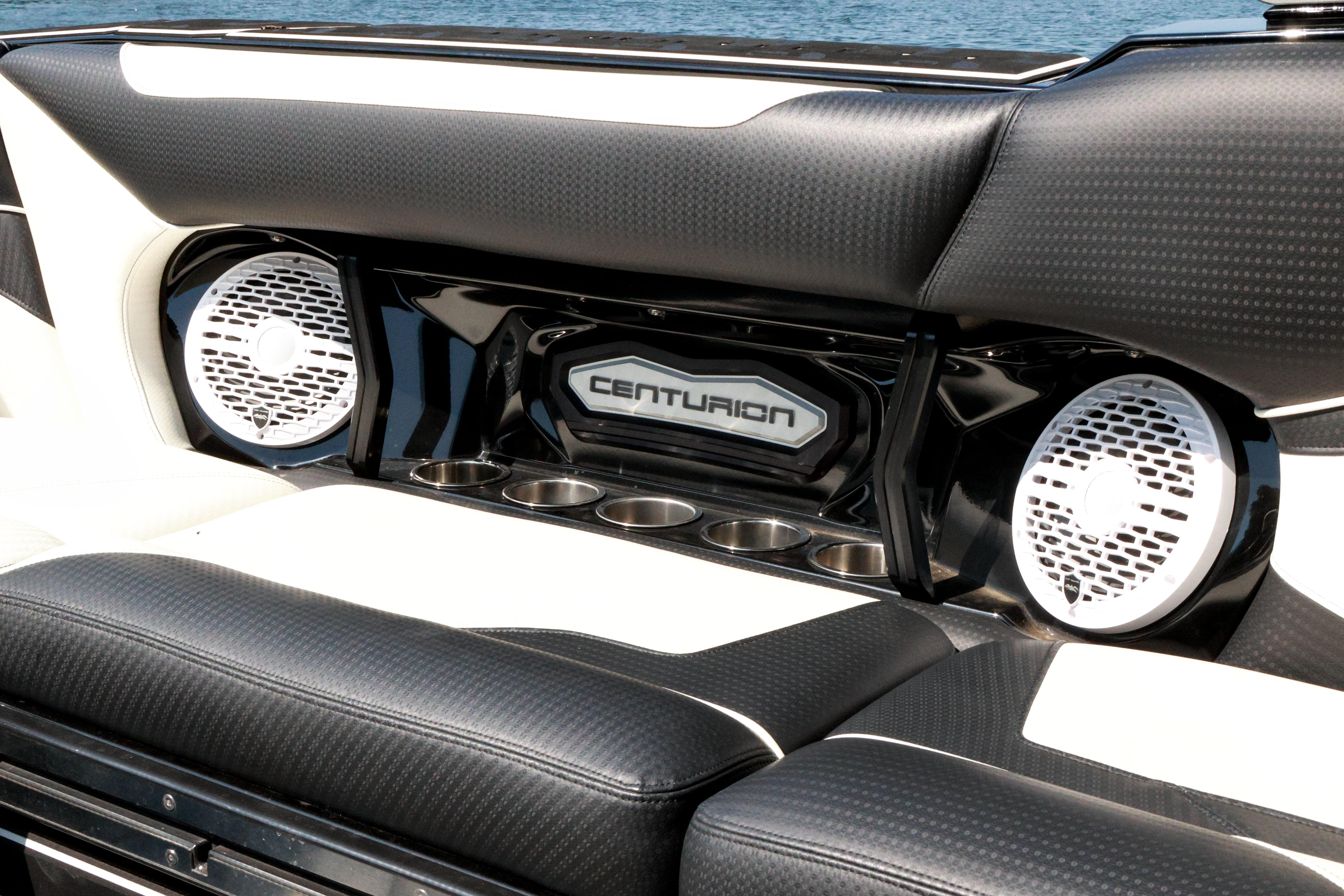 2022 Centurion Ri265 boat interior with speakers and cup holders.