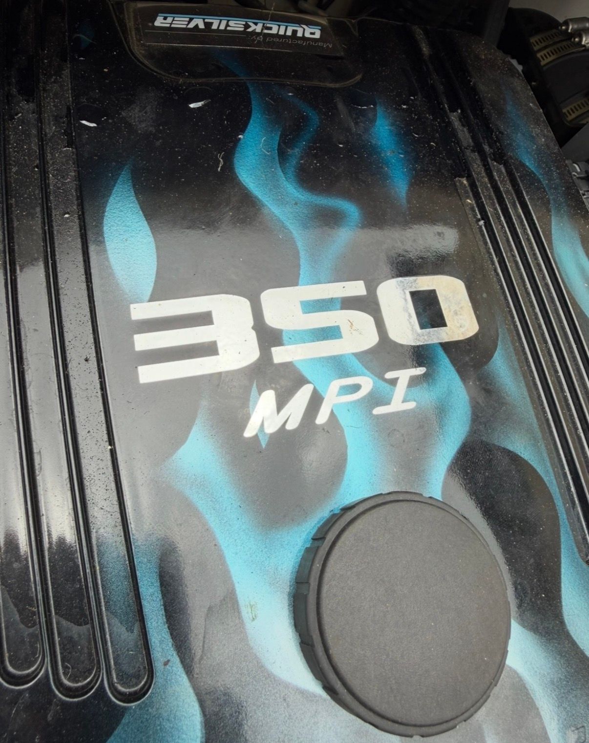 350 MPI engine cover with blue flame design.