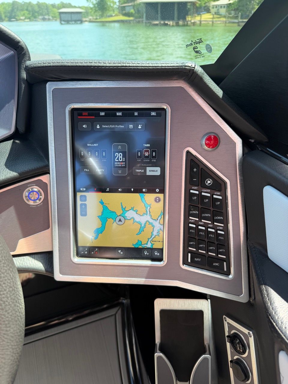 2023 MasterCraft X24 boat dashboard with touchscreen and navigation system.