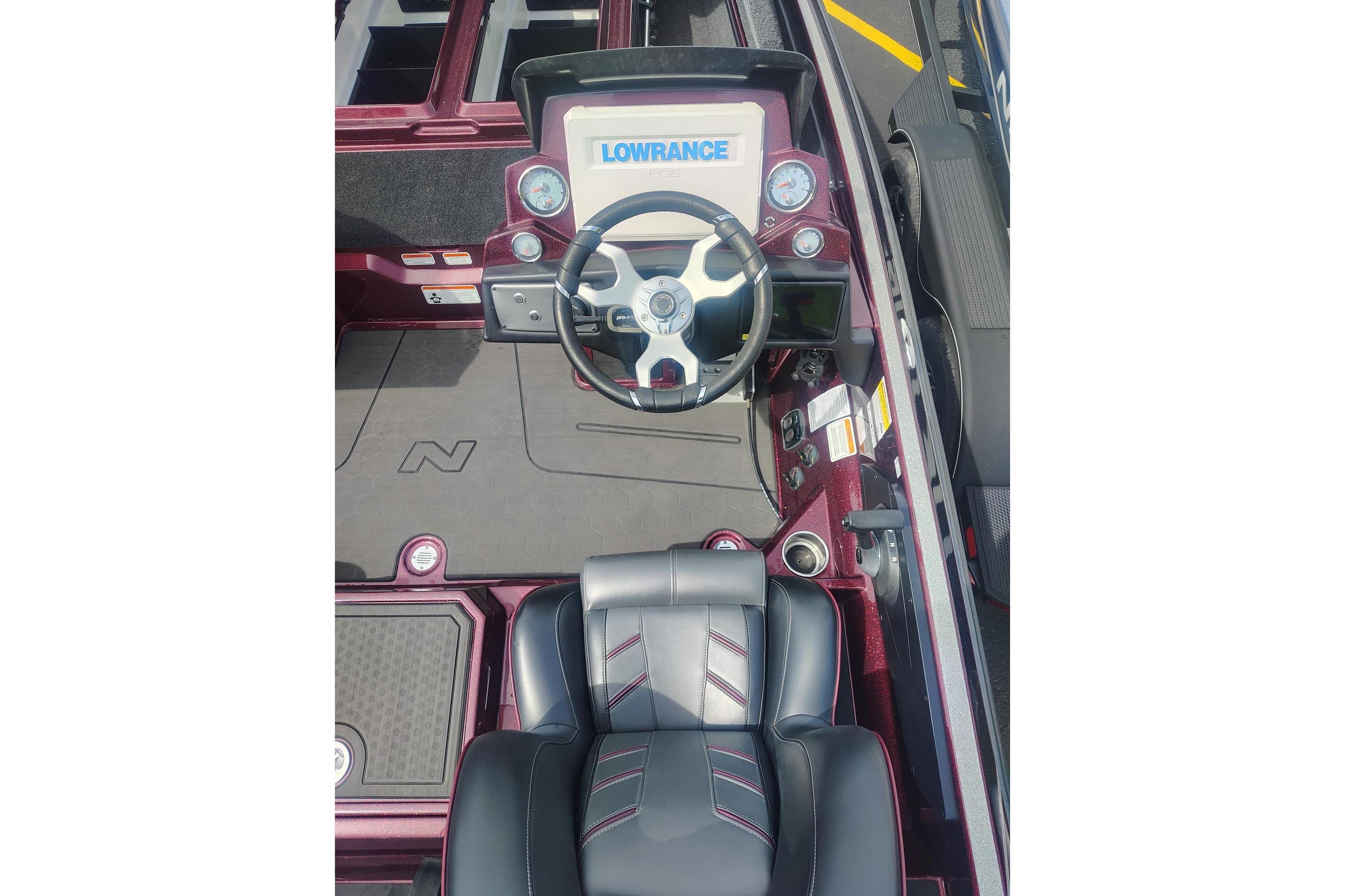 2024 Nitro Z21 XL boat cockpit with Lowrance electronics and sleek black seating.