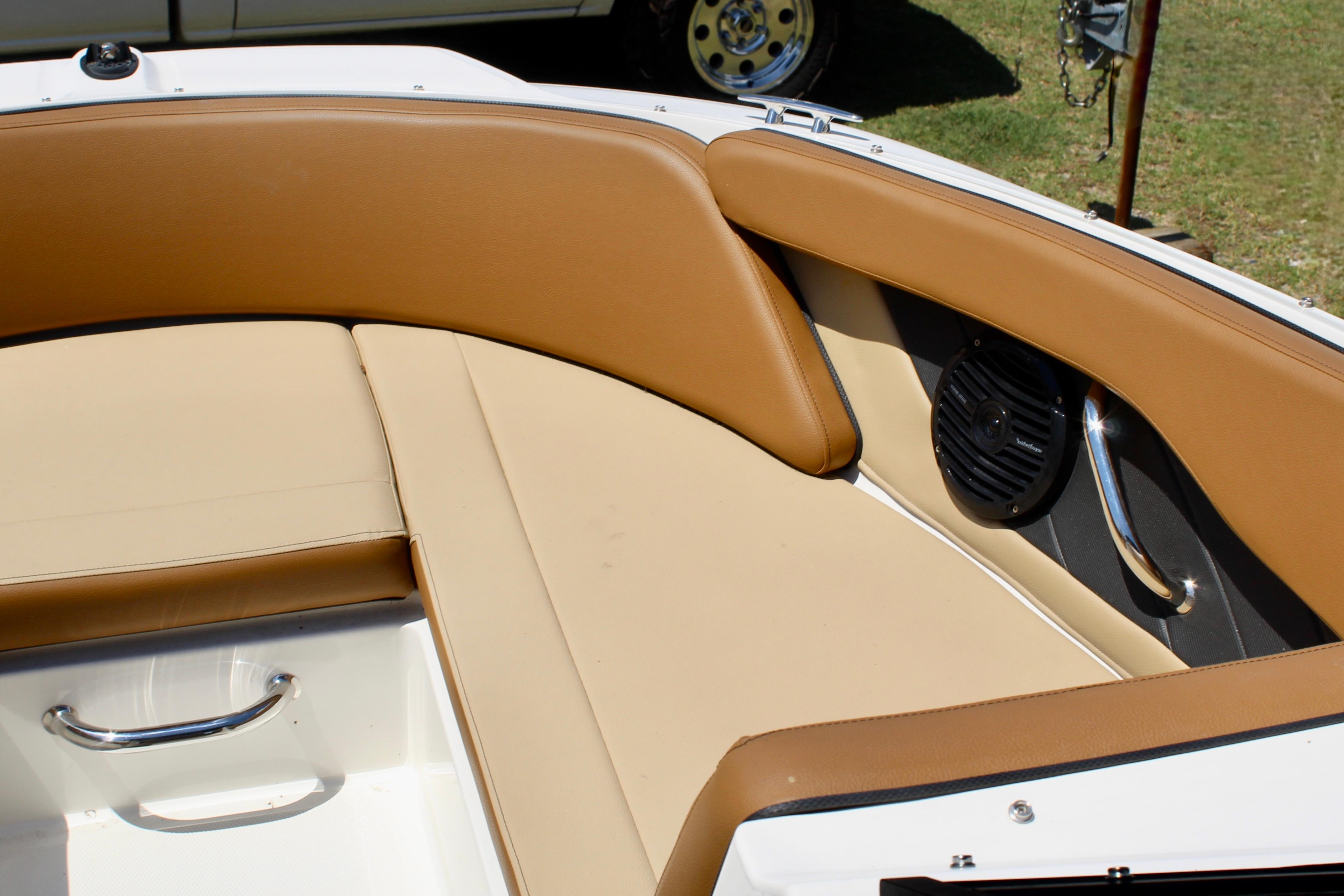2018 Sea Ray SPX 190 Outboard boat interior with tan seating and speaker.