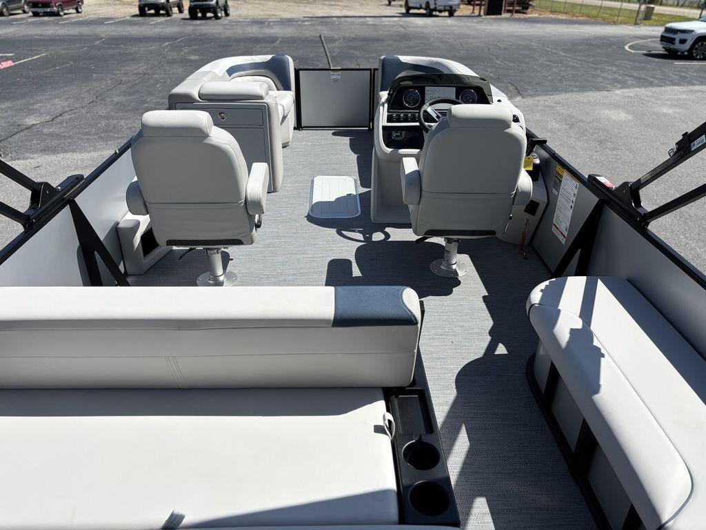 2026 Godfrey SWEETWATER 2286 SFL pontoon boat interior with modern seating and steering console.